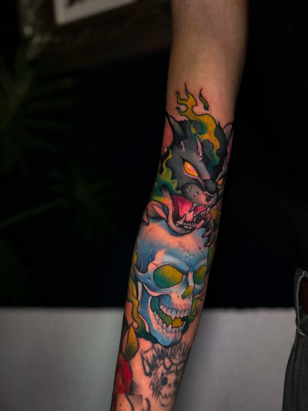 Cat and skull with flames American traditional tattoo on the forearm by bella :)