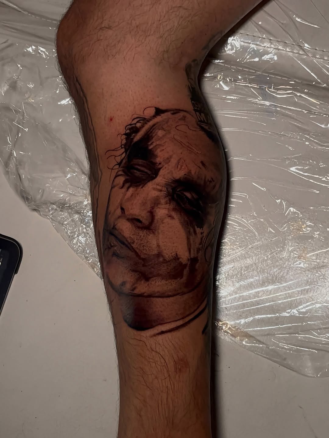 Tattoo by @therealtatbrat — realism, black_and_grey