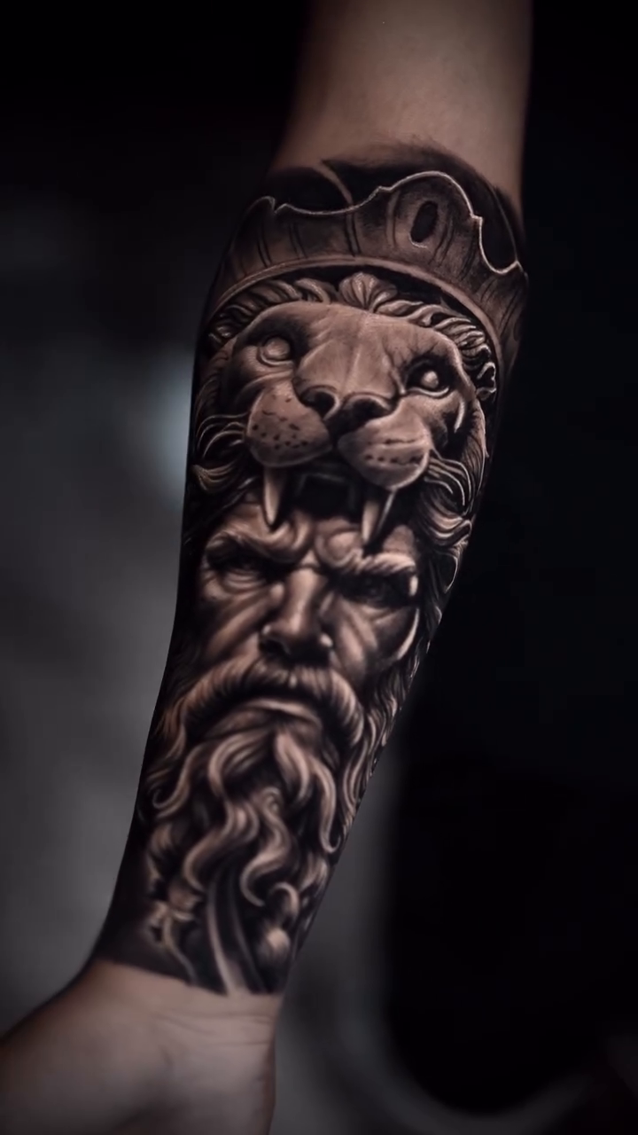 Bearded man with lion headdress realism tattoo on the forearm by π¨π»βπ¨Ever luis Rivero π¨π»βπ¨