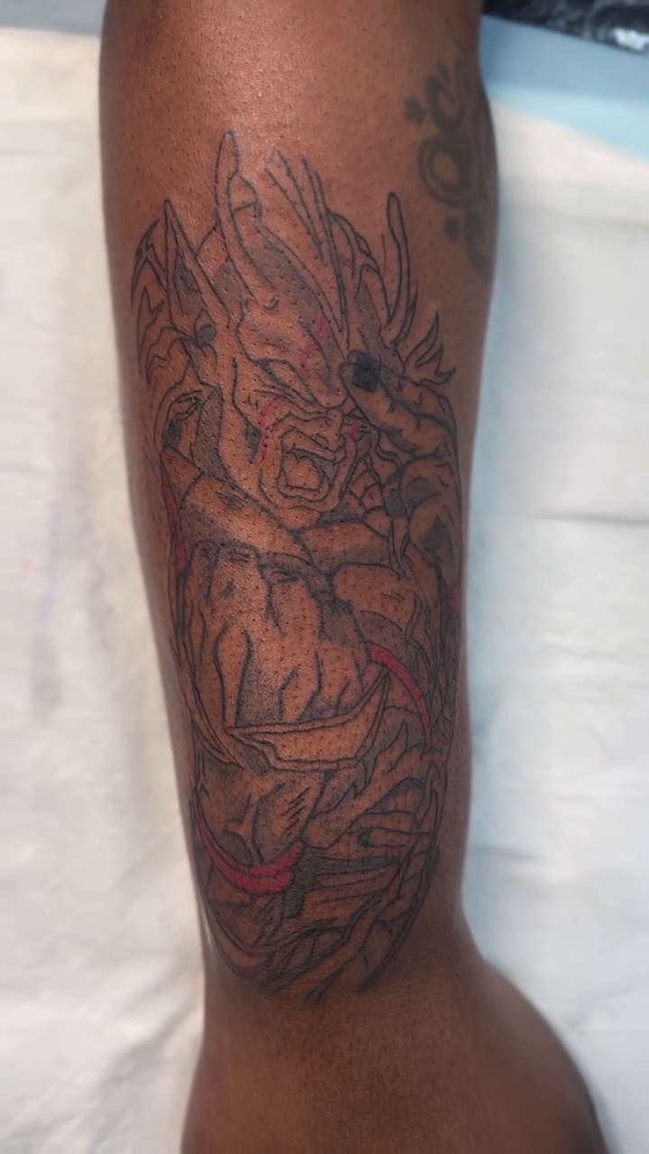 Dragon and flowers tattoo anime tattoo on the forearm by Charlotte Tattoo Artist💉