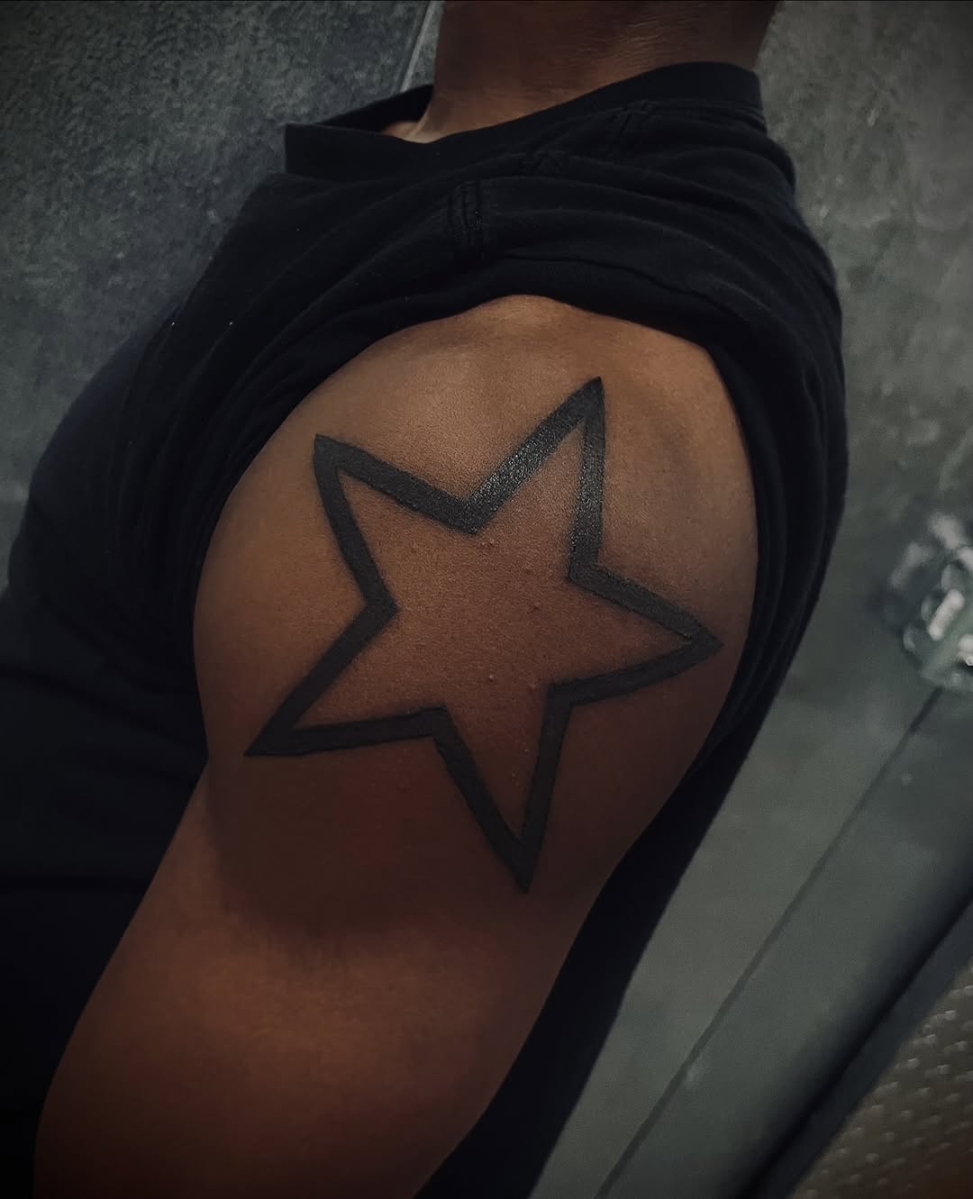 Star fine line tattoo on the shoulder by Alejandro N Duran