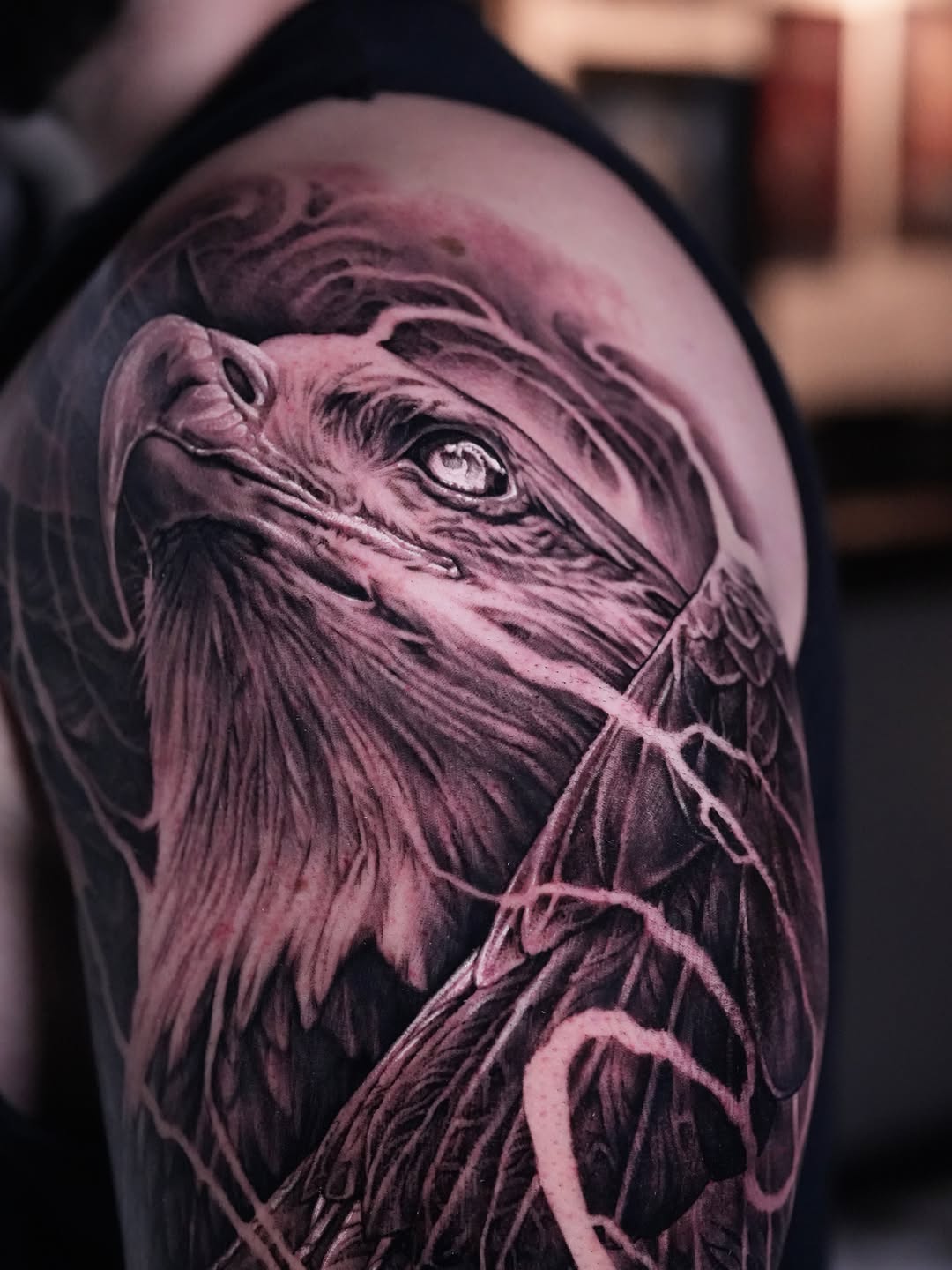 Eagle portrait surrealism tattoo on the shoulder by Nico Perez