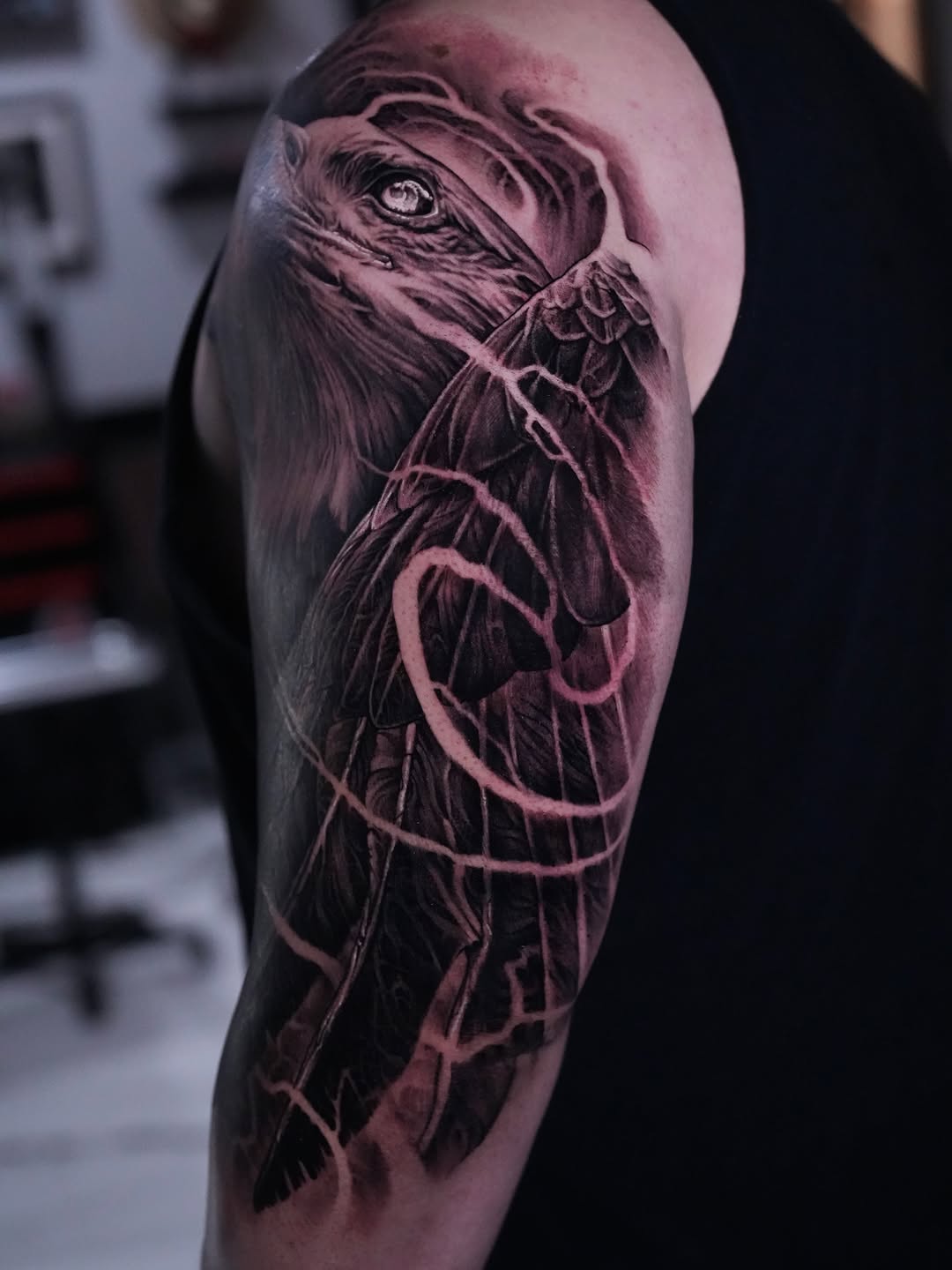 Eagle head and wing realism tattoo on the forearm by Nico Perez
