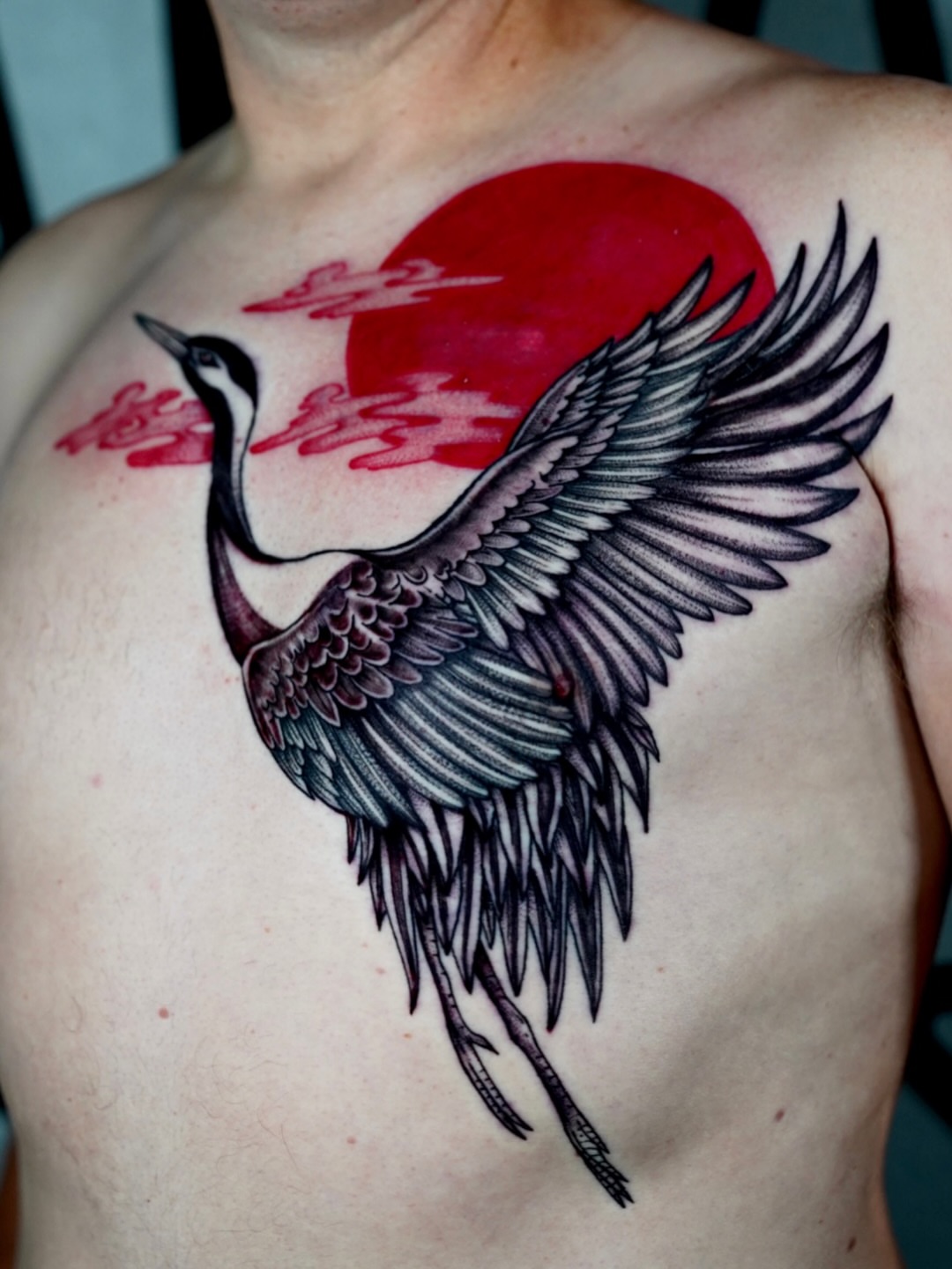 Crane and sun japanese irezumi tattoo on the chest by Kirsten Cameron