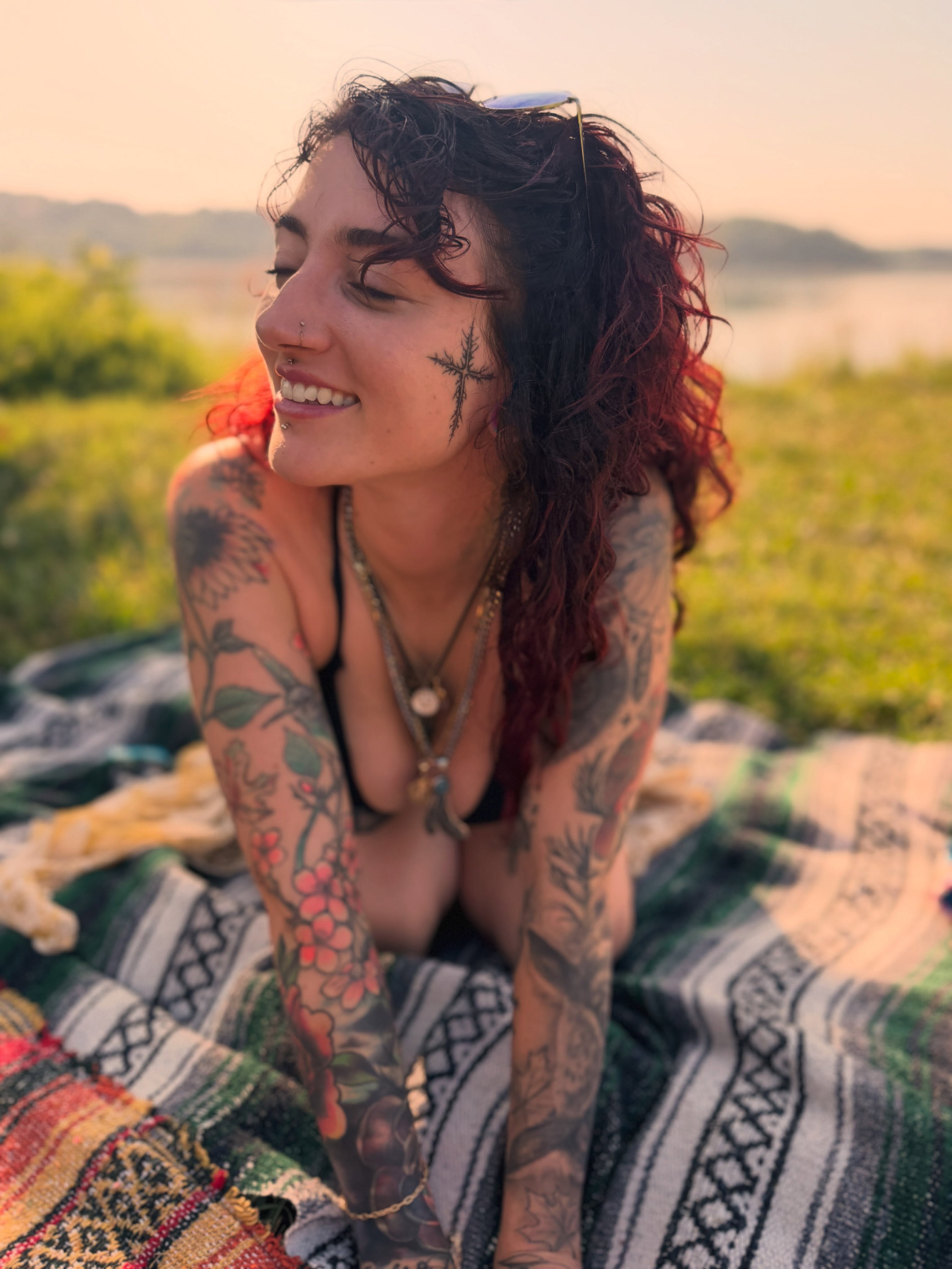 Floral and vine American traditional tattoo on the torso by Summer Christman