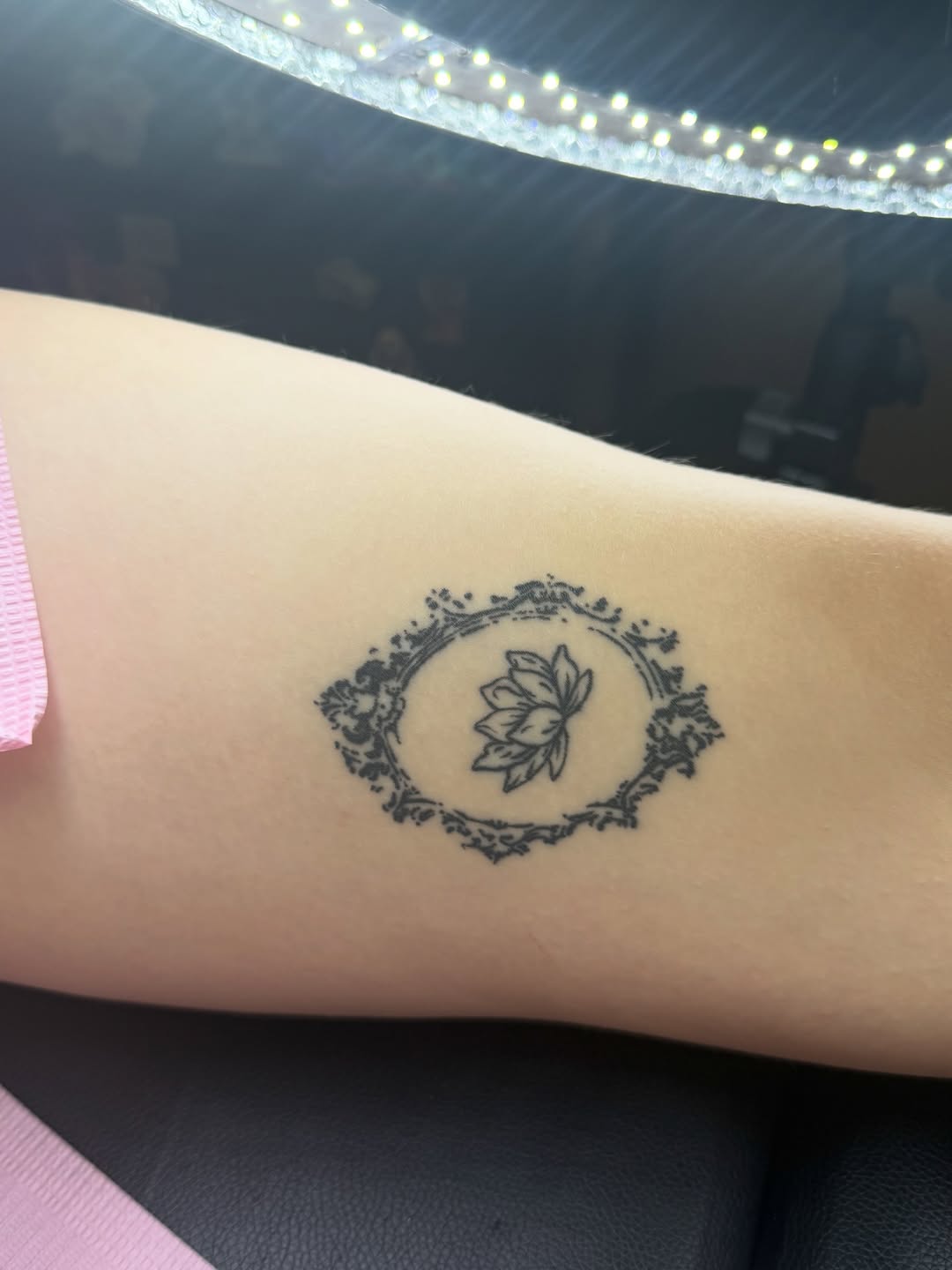 Lotus flower in ornate frame dotwork tattoo on the forearm by Room 707 Tattoo 🍰🍓