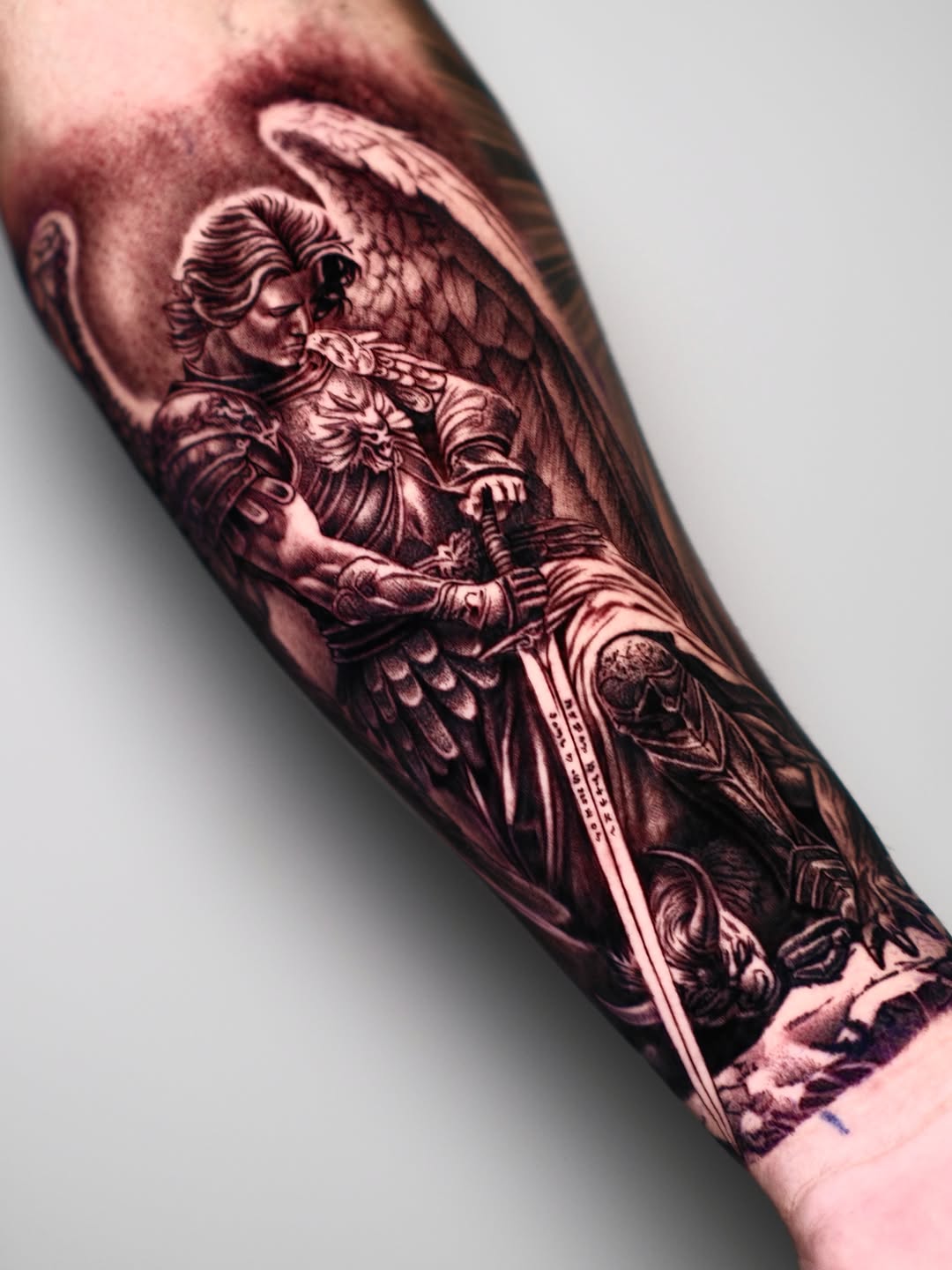 Archangel Michael with sword realism tattoo on the forearm by Dallas tattoo artist