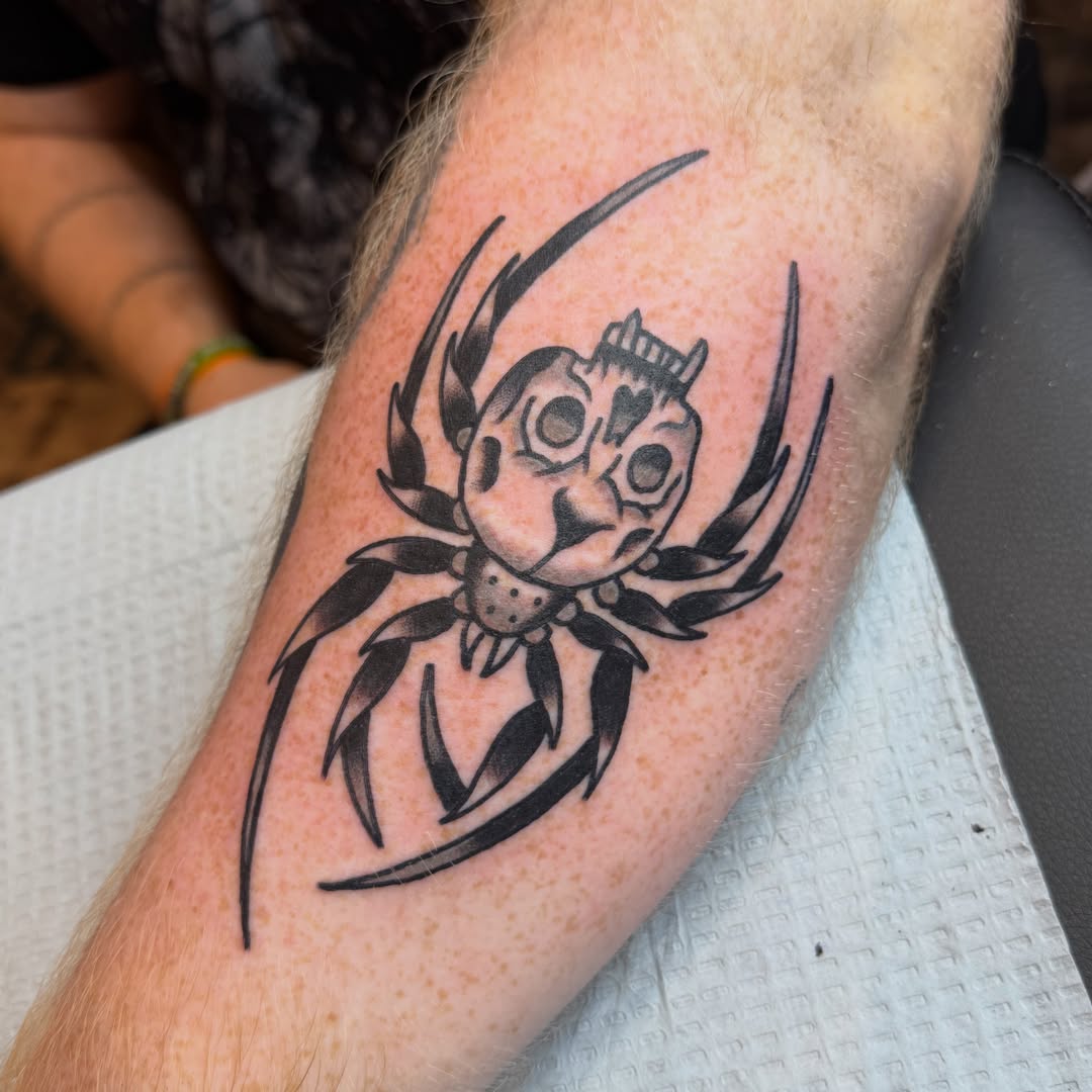 Spider black and grey tattoo on the forearm by Carl Testi