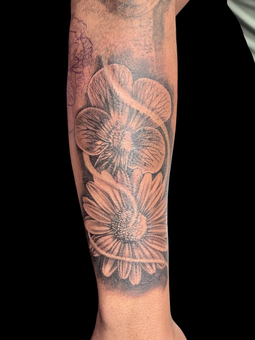 Two flowers dotwork tattoo on the forearm by @inkwitatlas