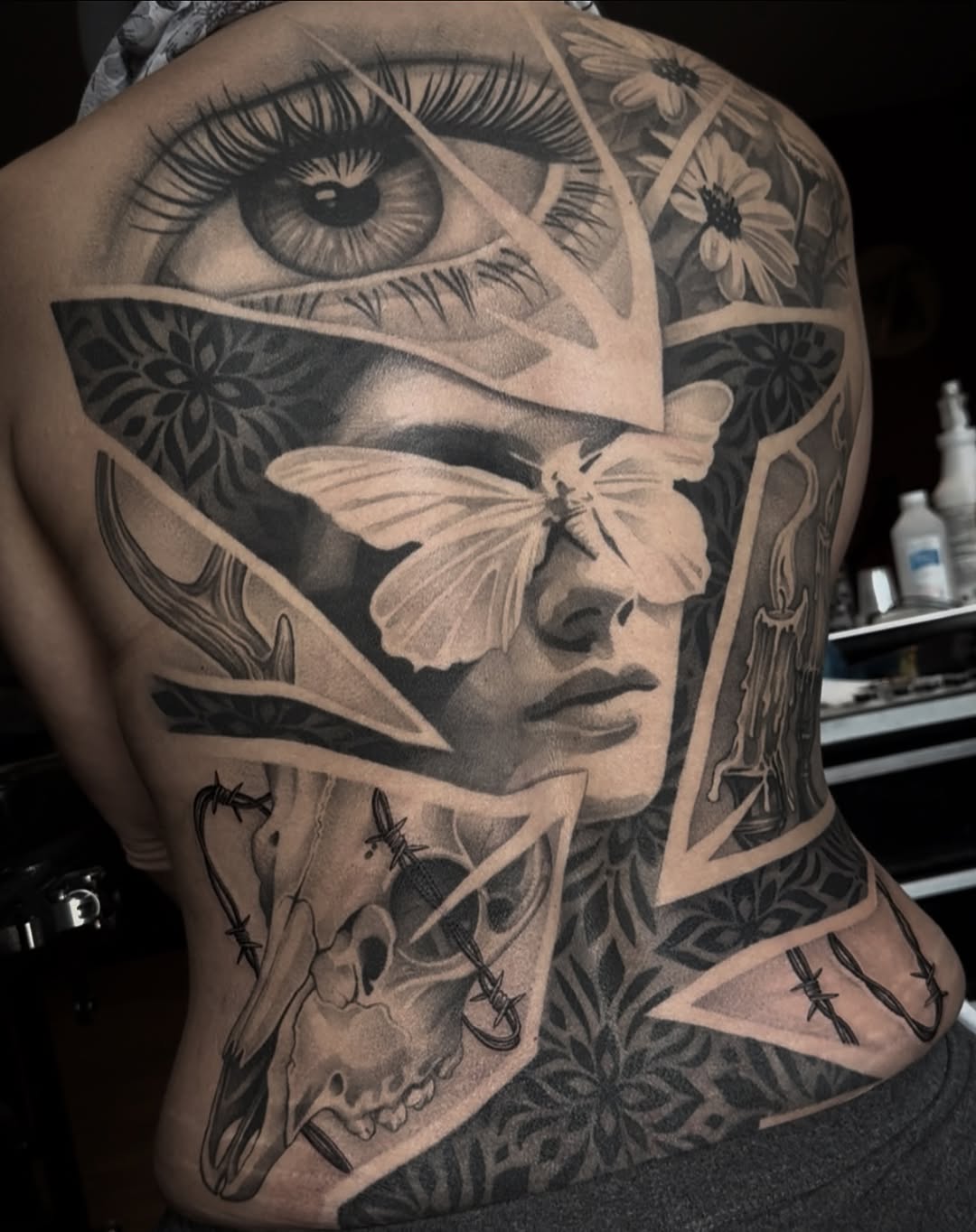 Tattoo by @elijahforstertattoos — realism, black_and_grey