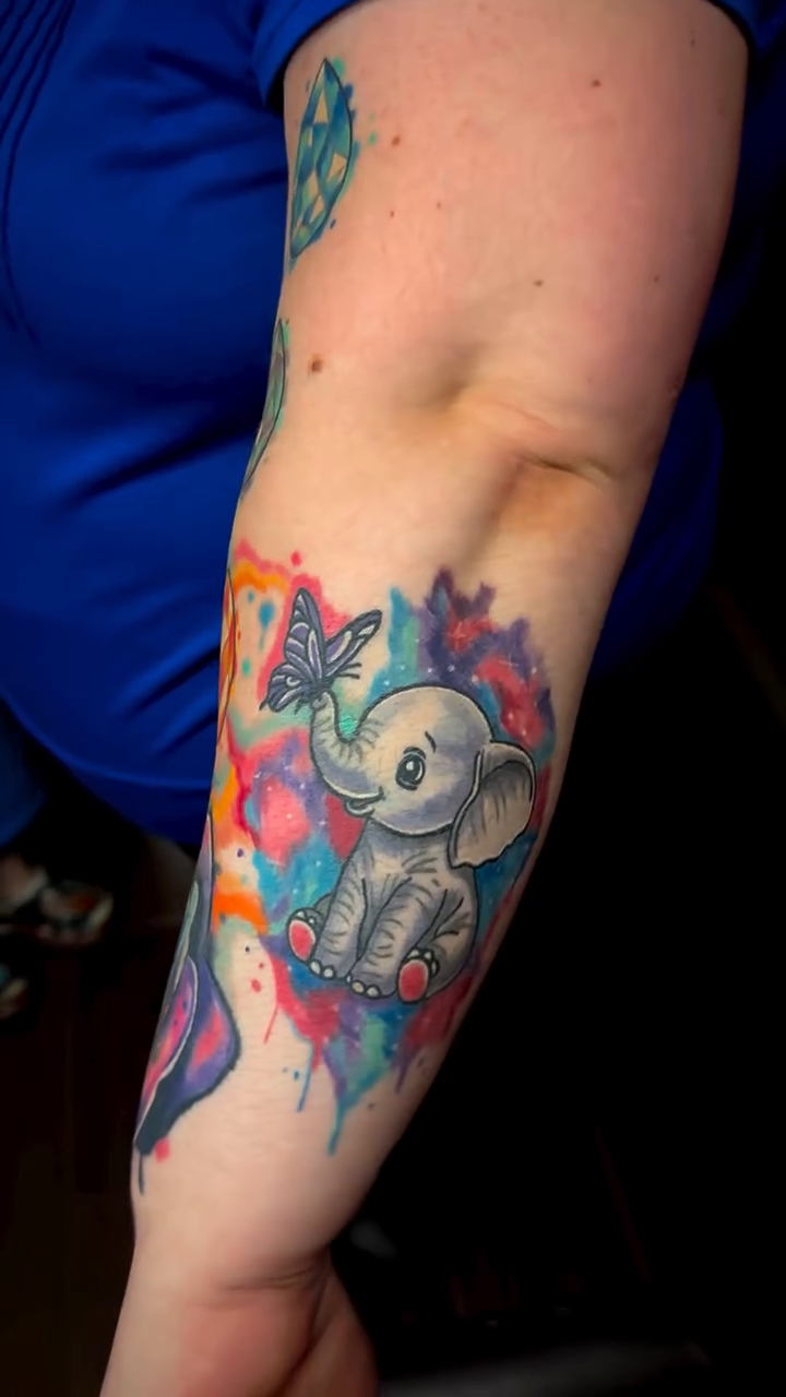 Watercolor tattoo on the forearm by Anthony Guido