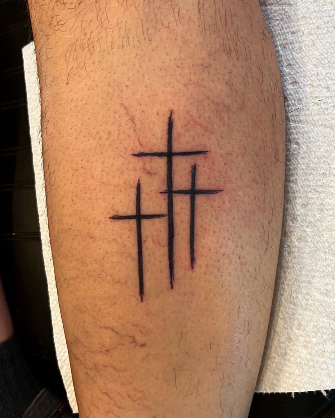 Three crosses tattoo on the forearm by DL Tats, Cape Girardeau, Missouri