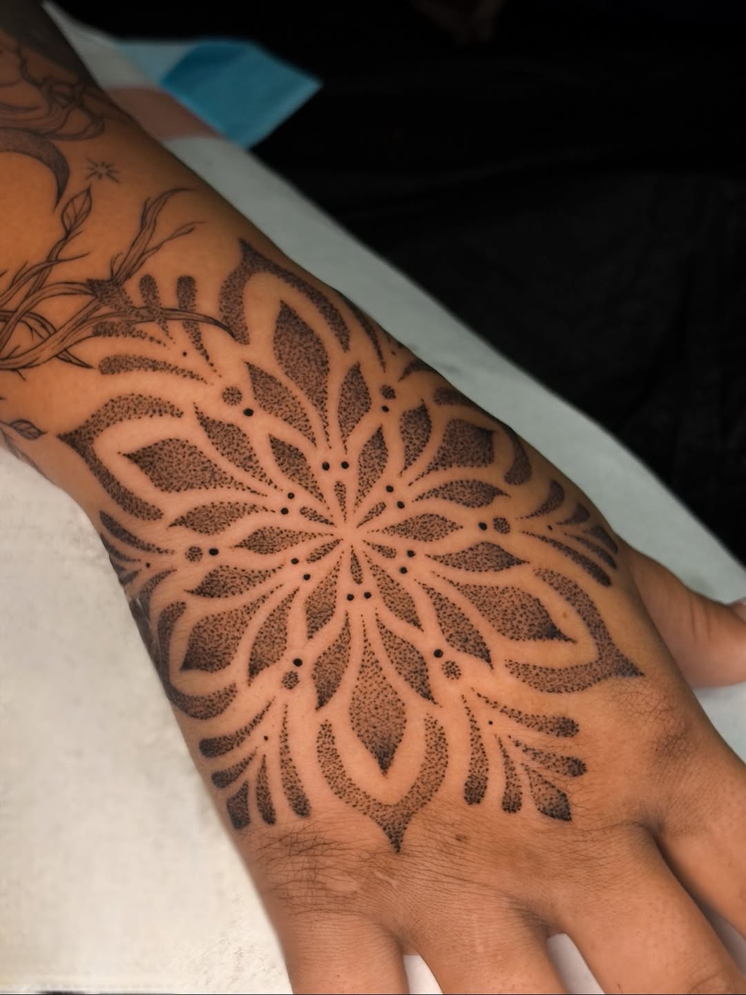 Mandala dotwork tattoo on the hand by Dee, San Diego, California