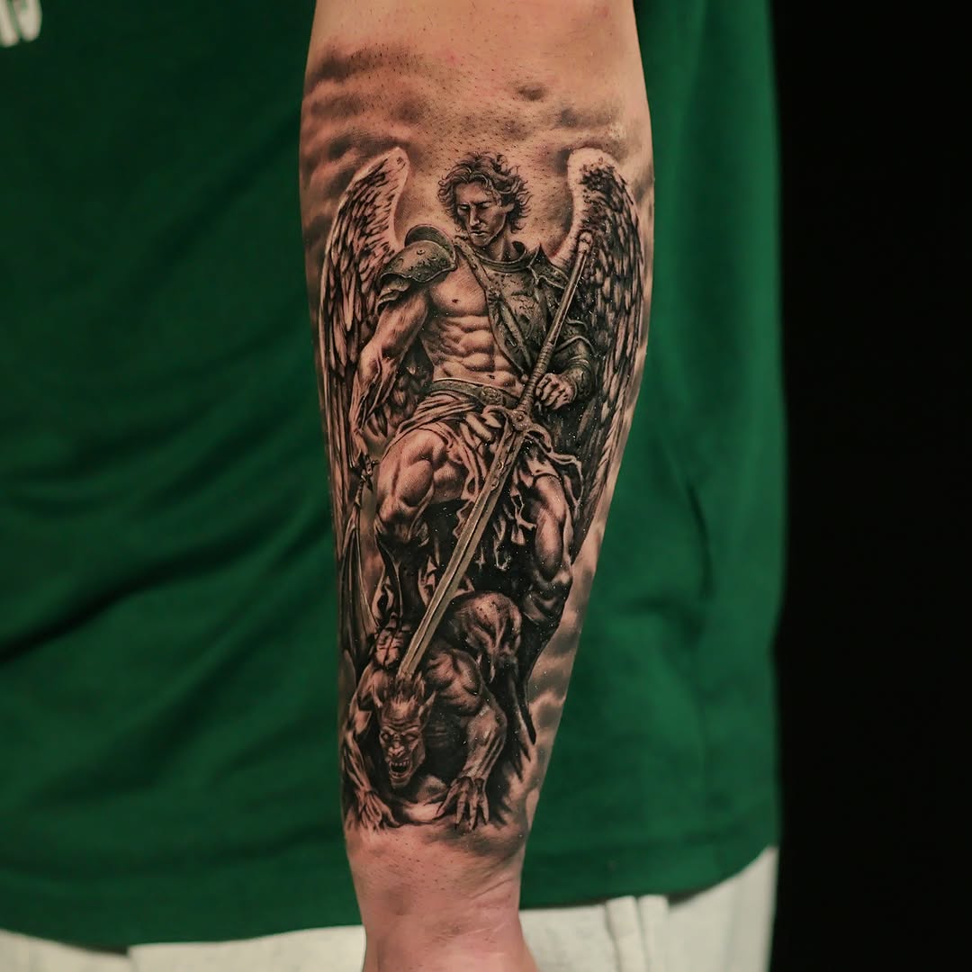 Angel fighting demon realism tattoo on the forearm by Felipe Andrade