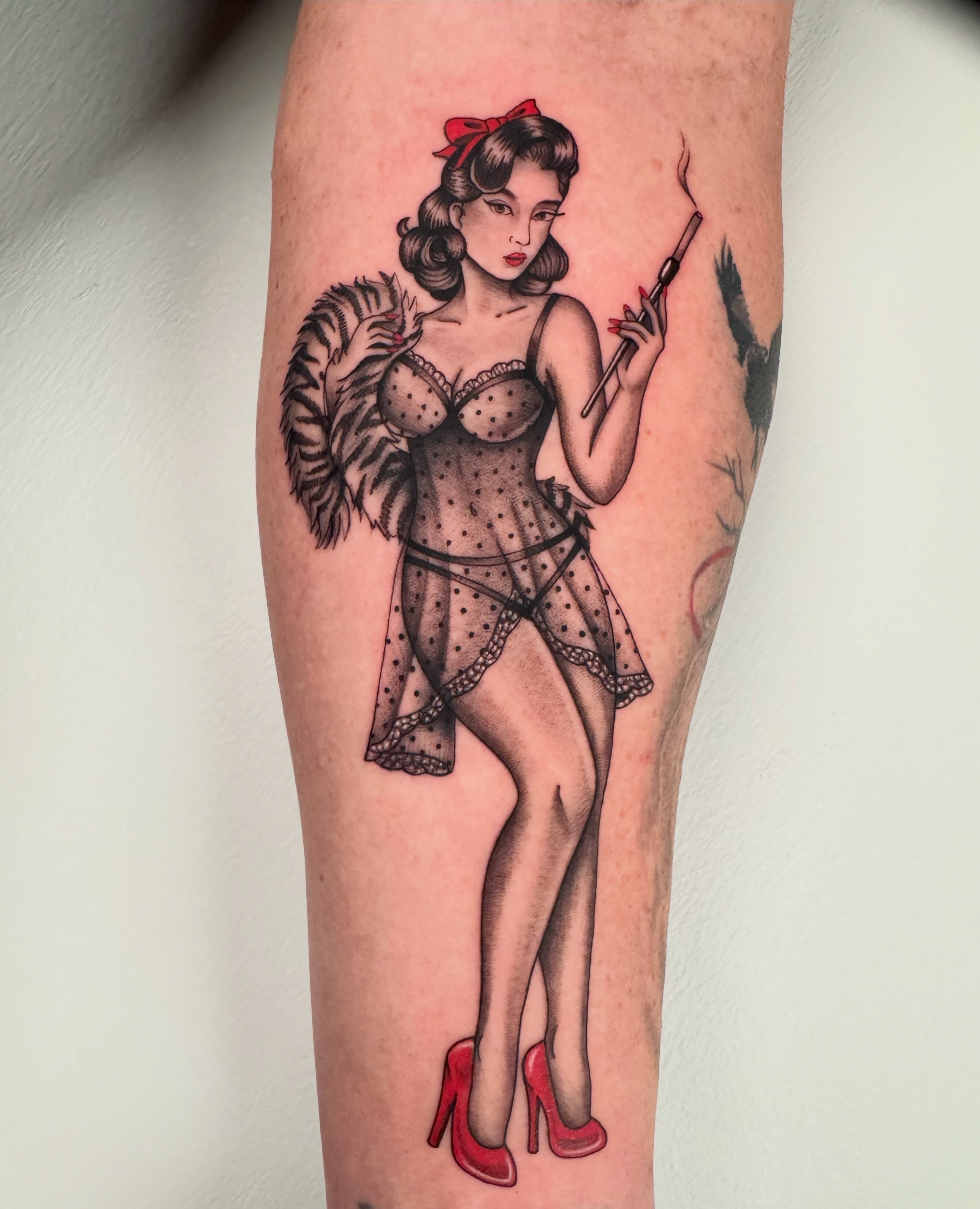 Pin-up girl American traditional tattoo on the forearm by Austin Tattoo Artist, Austin, Texas