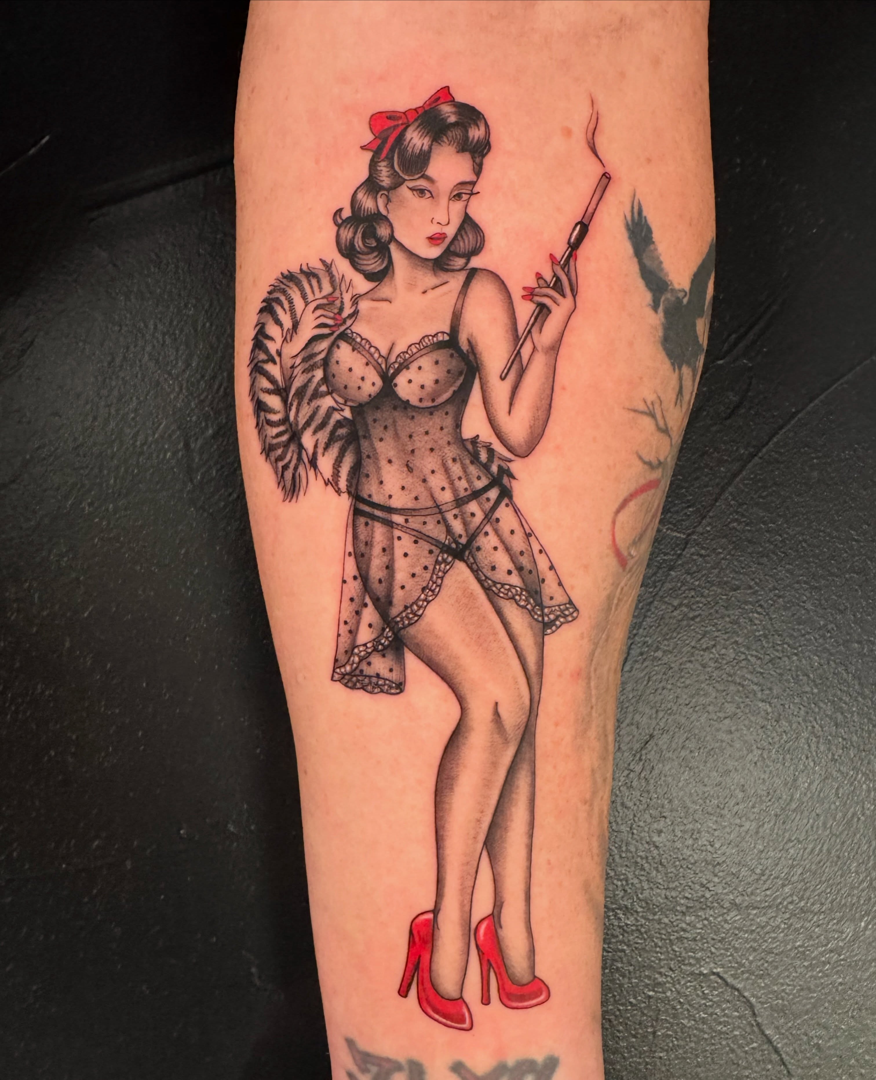 Pin-up girl American traditional tattoo on the forearm by Austin Tattoo Artist, Austin, Texas
