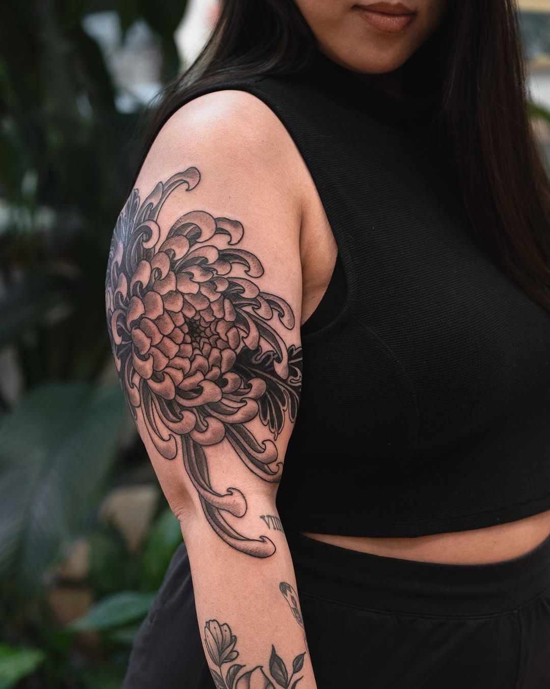 Chrysanthemum and waves Japanese tattoo by Matt Leibo, San Francisco, California