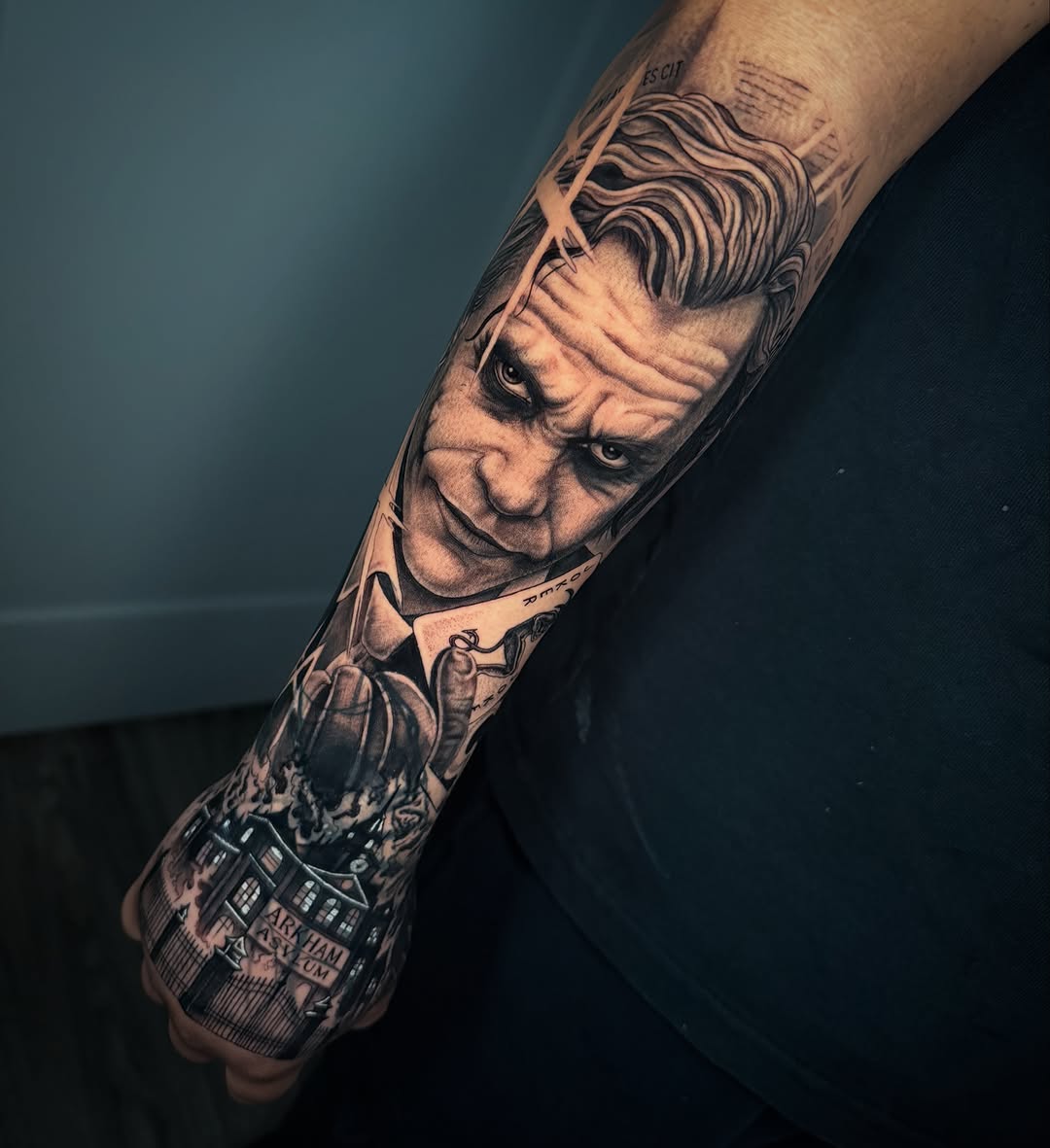 The Joker and Arkham Asylum realism tattoo on the forearm by Las Vegas Tattoo Artist