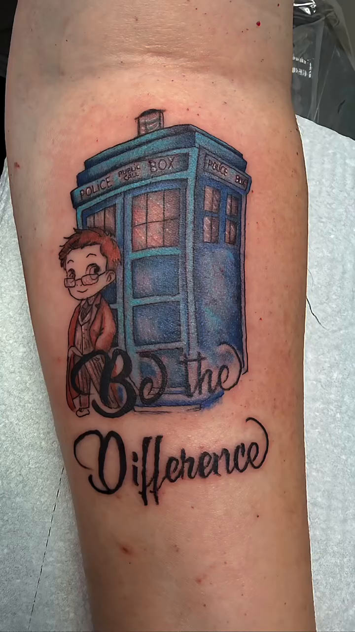 Tardis and quote tattoo on the forearm by Tattoos by Dan Hatcher Carr, Parma, Ohio