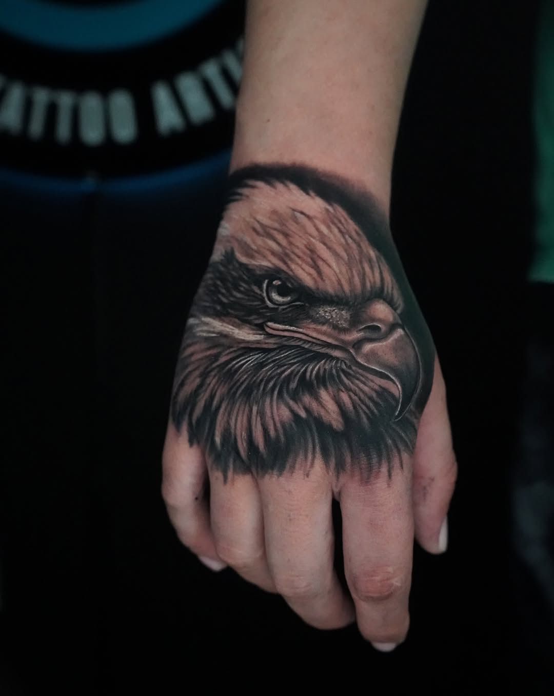 Eagle head realism tattoo on the hand by Carlos Trujillo