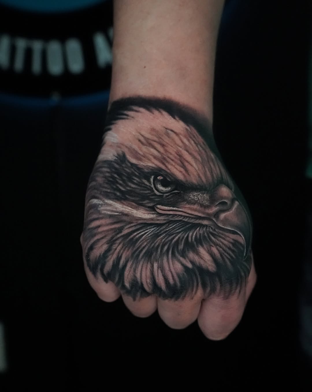 Eagle head realism tattoo on the hand by Carlos Trujillo