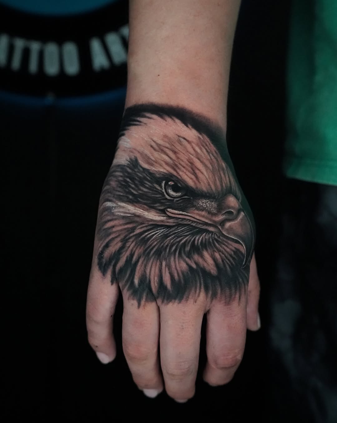Eagle head realism tattoo on the hand by Carlos Trujillo