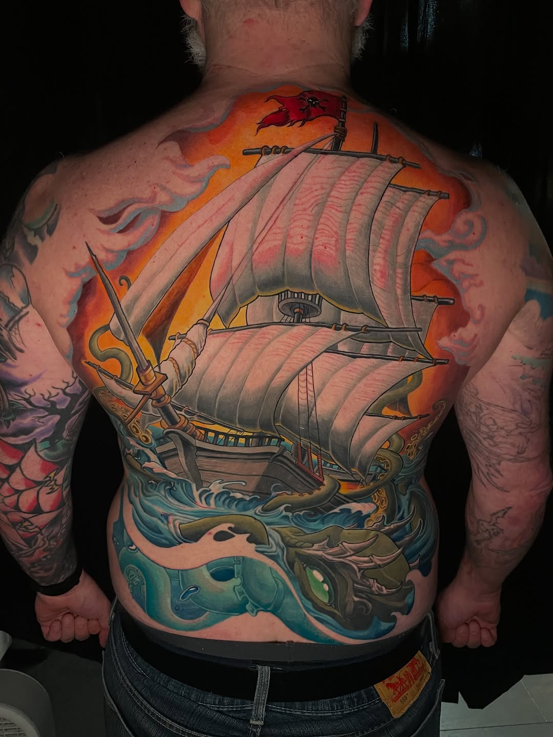 Ship and kraken Japanese tattoo on the back by Zoe "Z" Fisk