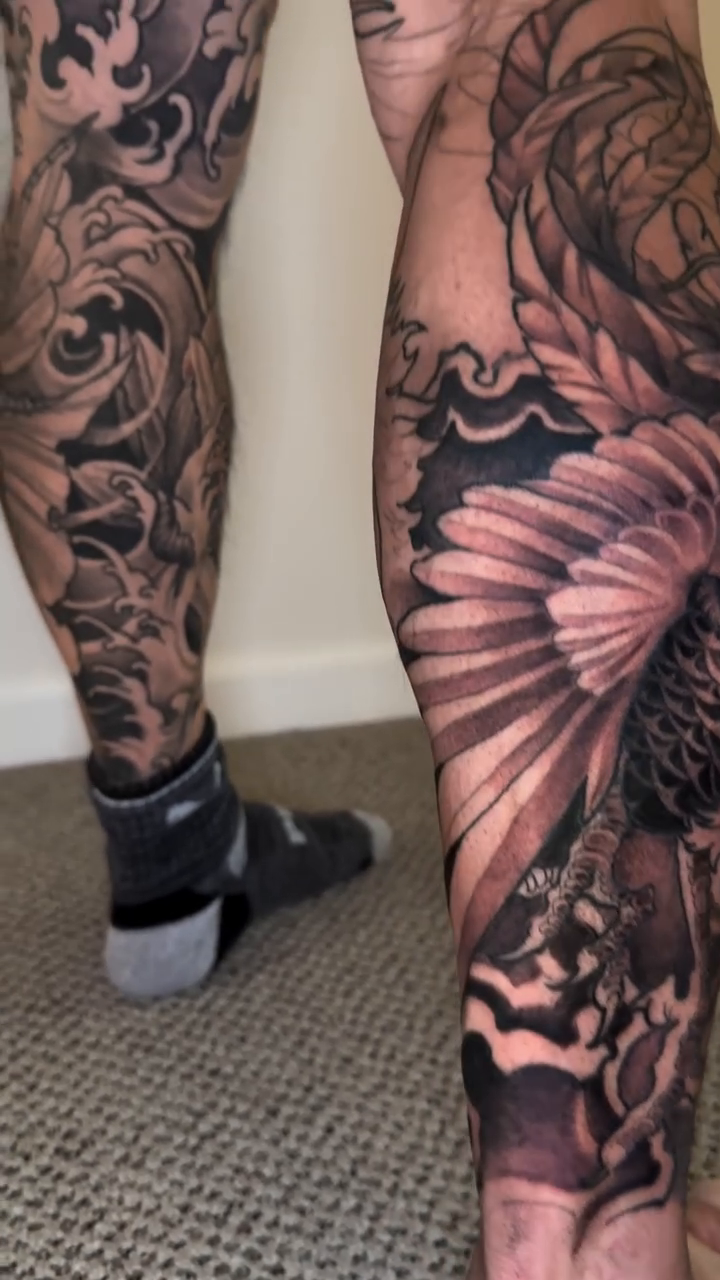 Dragon and phoenix leg sleeve Japanese tattoo on the leg by Mike Nance