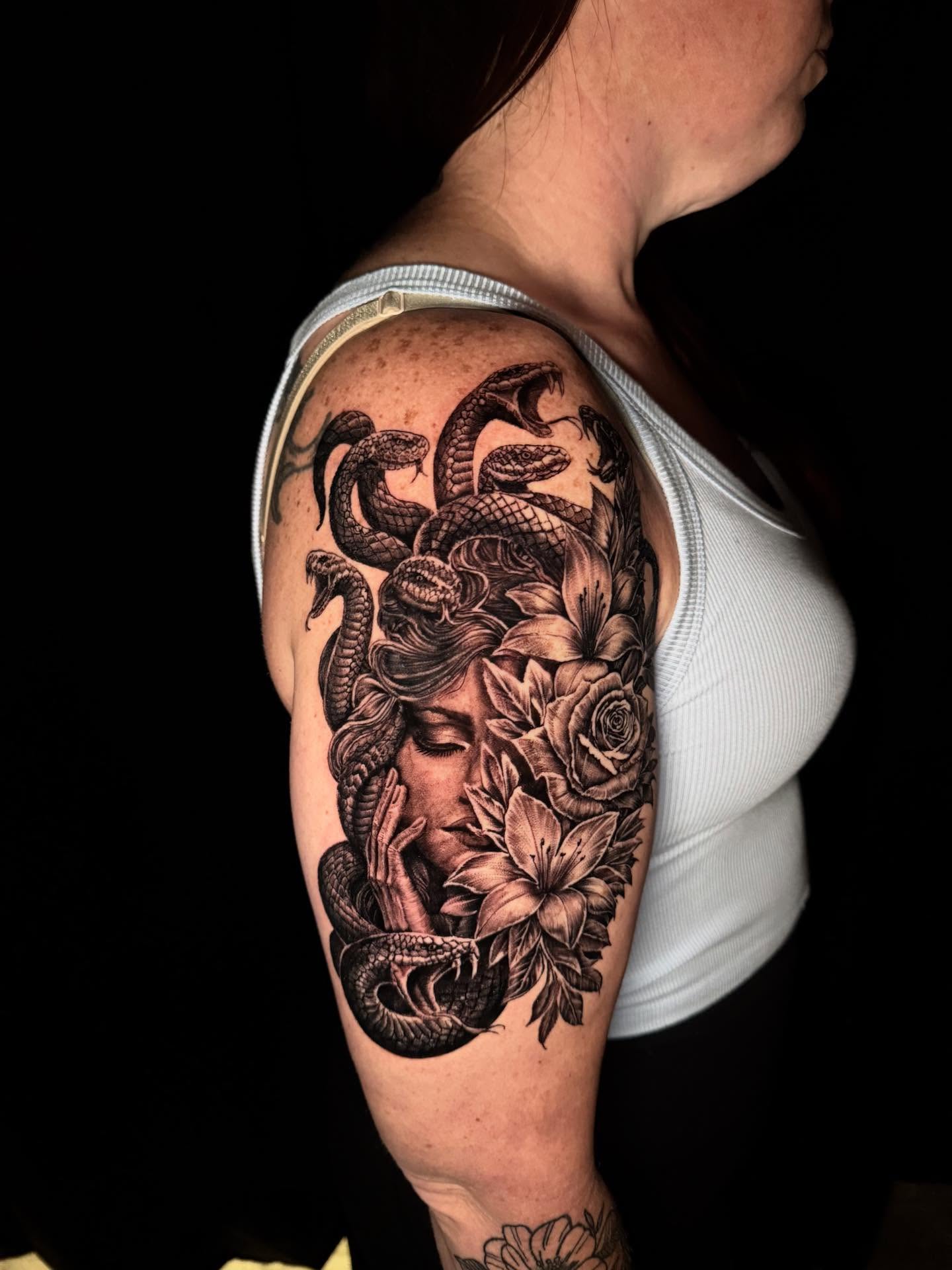 Medusa with snakes realism tattoo on the shoulder by Lord Daniel Serna