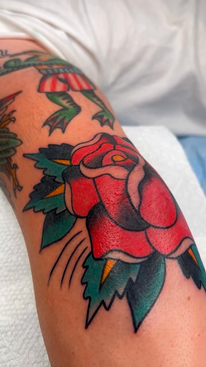 Rose and frog tattoo neo-traditional tattoo on the upper arm by Bright-bold-classic Tattoos, North Hills