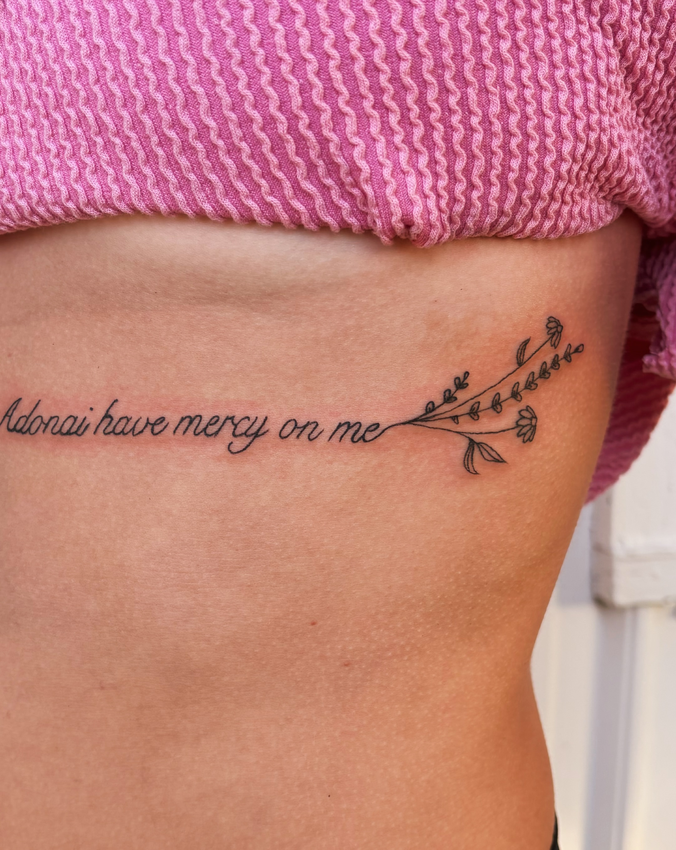 Adonai have mercy on me lettering script tattoo on the ribs by Inky Birdz Tattoos