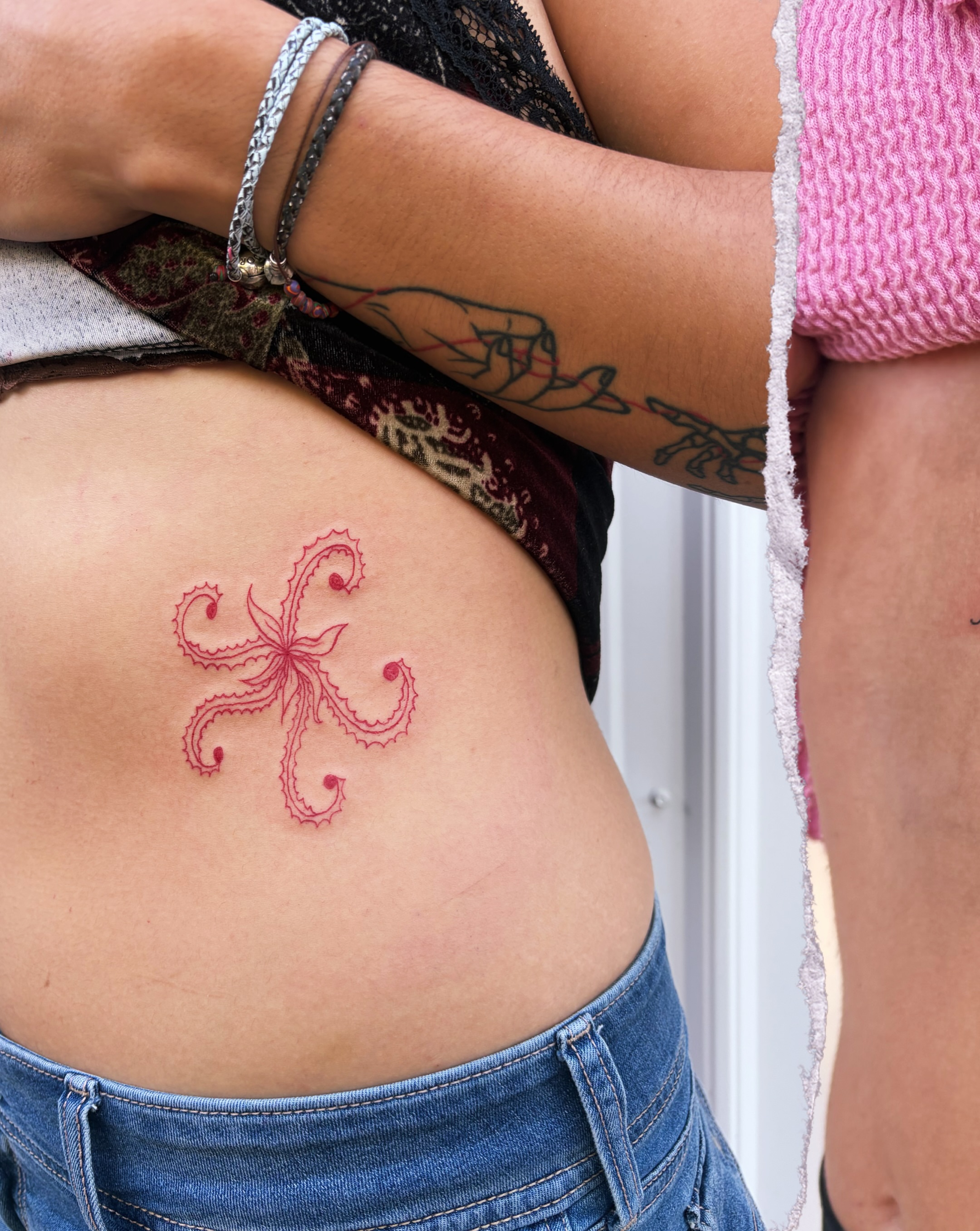 Octopus geometric tattoo on the torso by Inky Birdz Tattoos