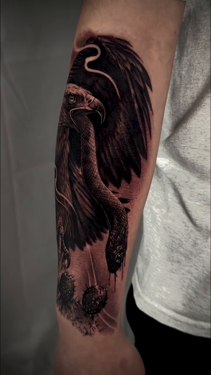 Eagle and snake tattoo realism tattoo on the forearm by DREW ROMERO - Colorado Tattoo Artist, Pueblo, Colorado
