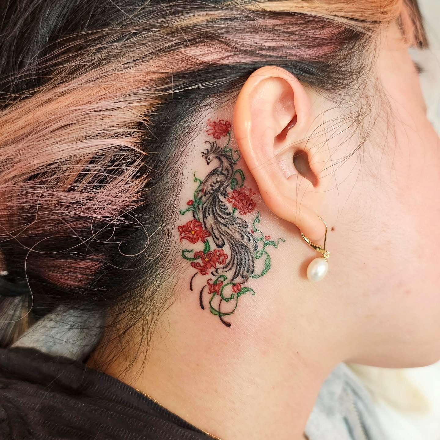 Peacock and flowers neo-traditional tattoo on the neck by Lili Gu