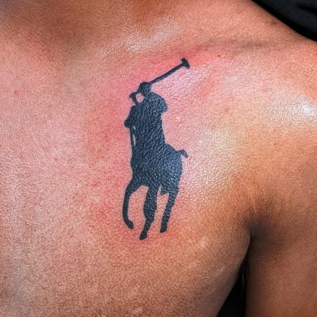 Polo Ralph Lauren logo tattoo on the chest by zion