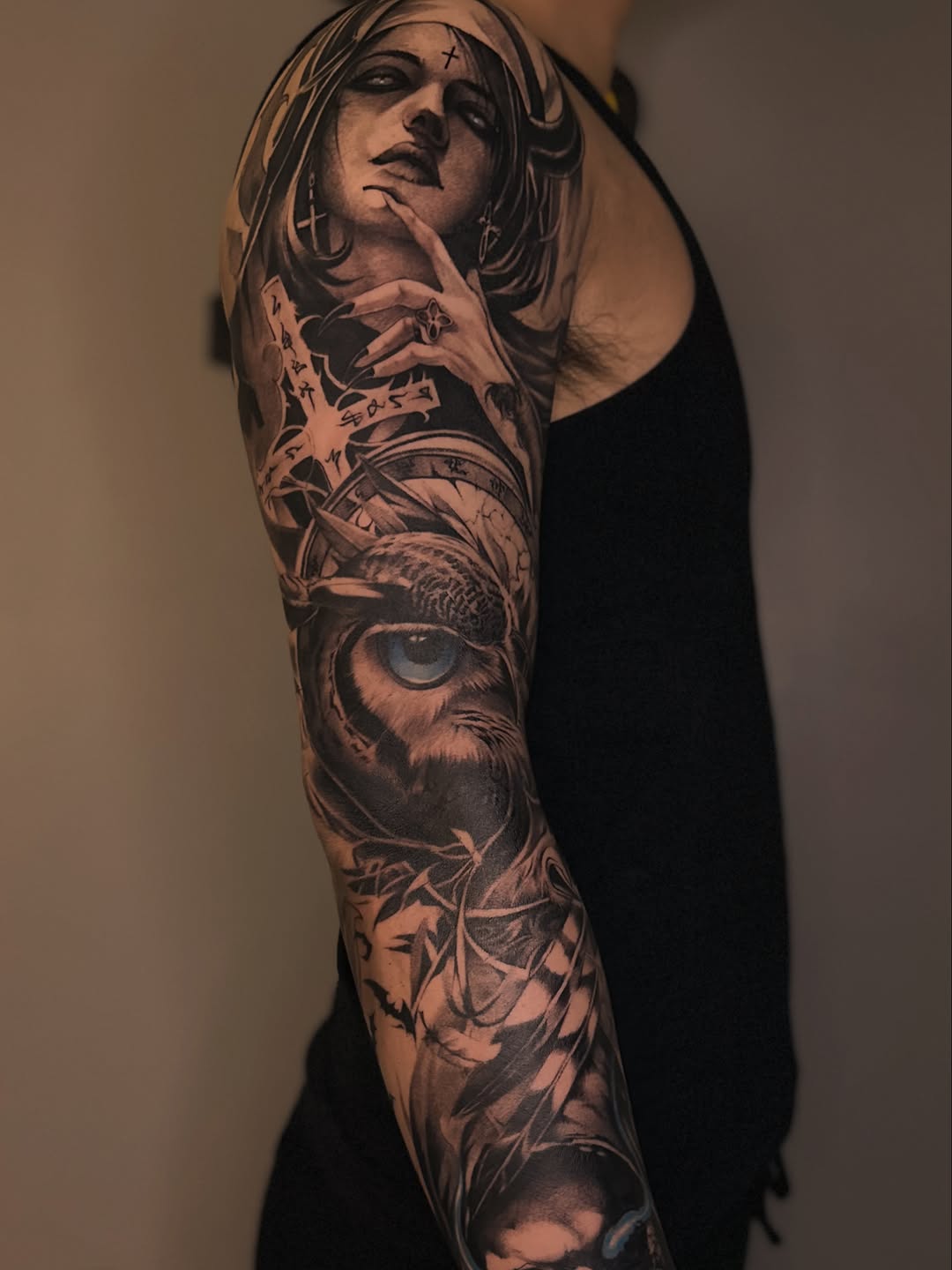Woman and owl sleeve realism tattoo on the upper arm by Shihao zhao