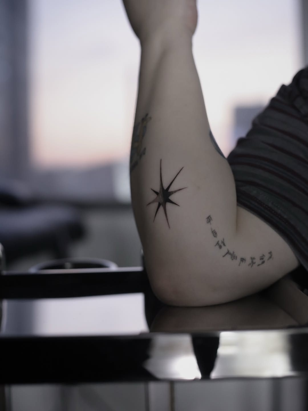 Star and script sketch tattoo on the forearm by Blight