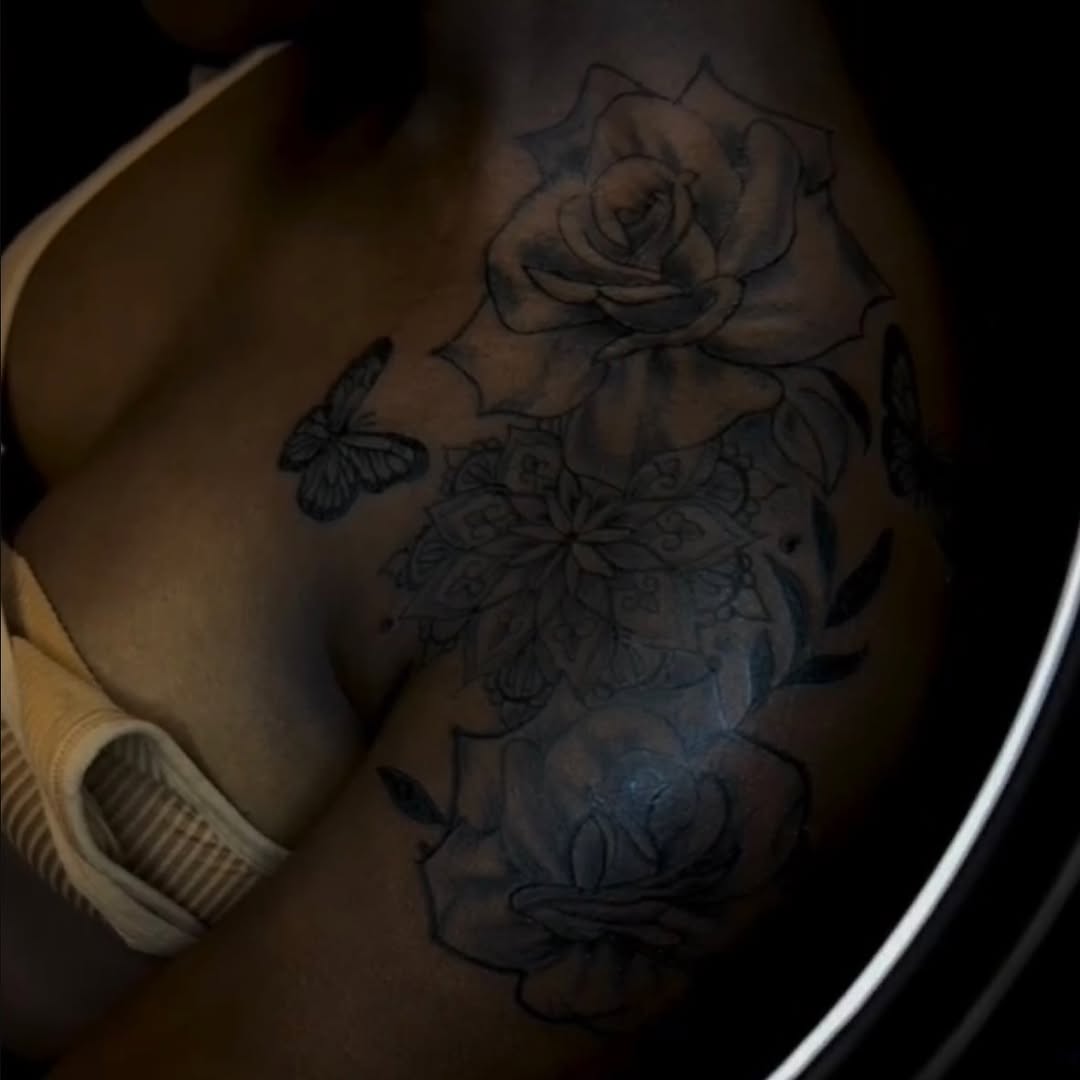 Roses and butterflies dotwork tattoo on the chest by Still Standing. Still Creating. 🖤