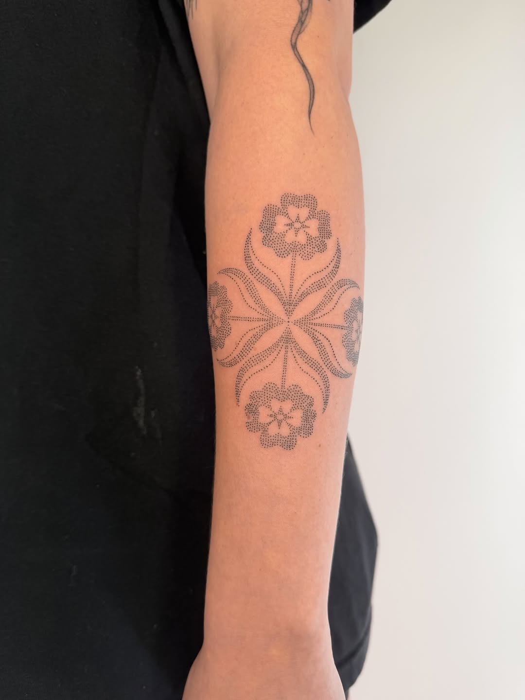 Tattoo by @leahramosink — dotwork, ornamental