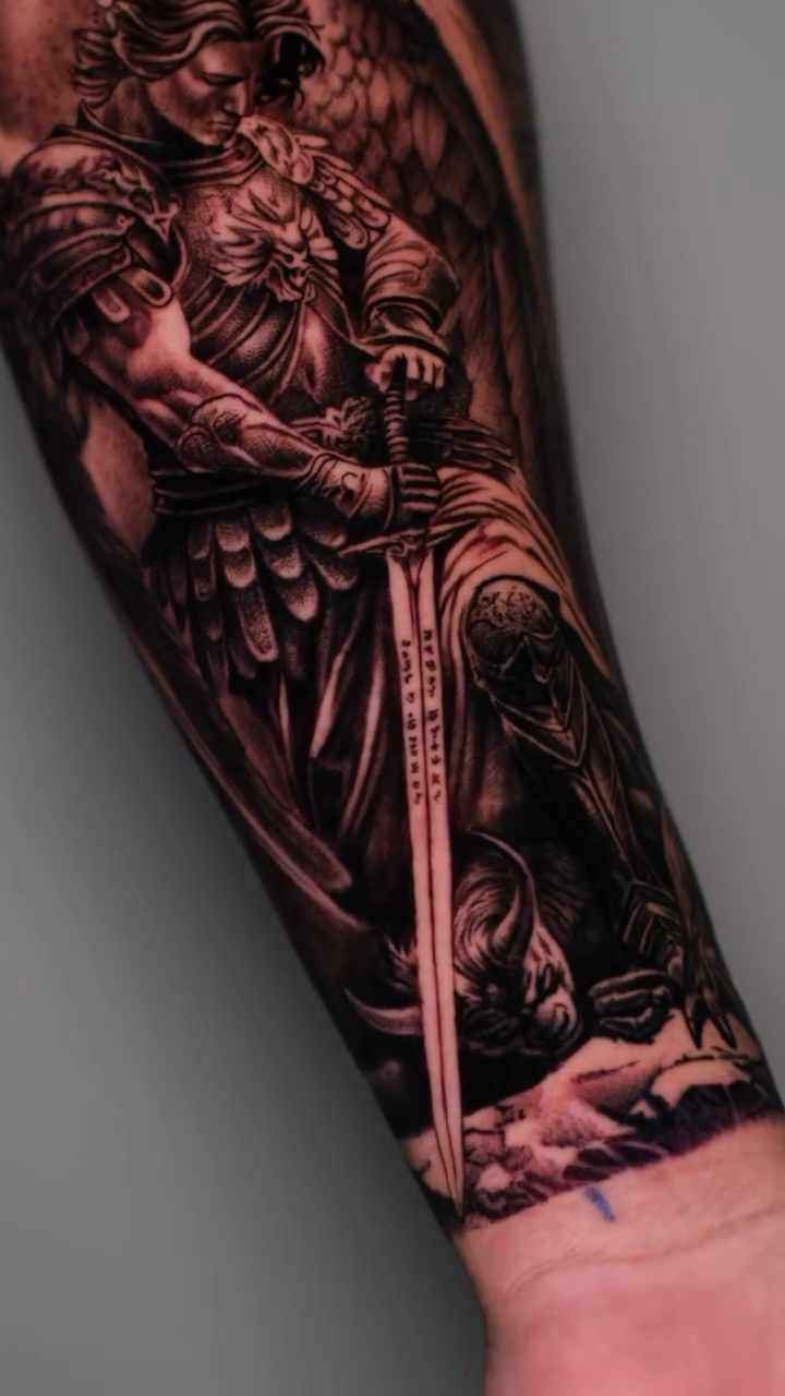 Angel with sword realism tattoo on the forearm by Dallas tattoo artist