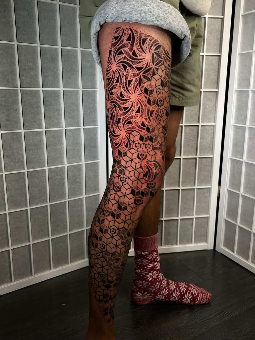 Geometric patterns geometric tattoo on the calf by Riley