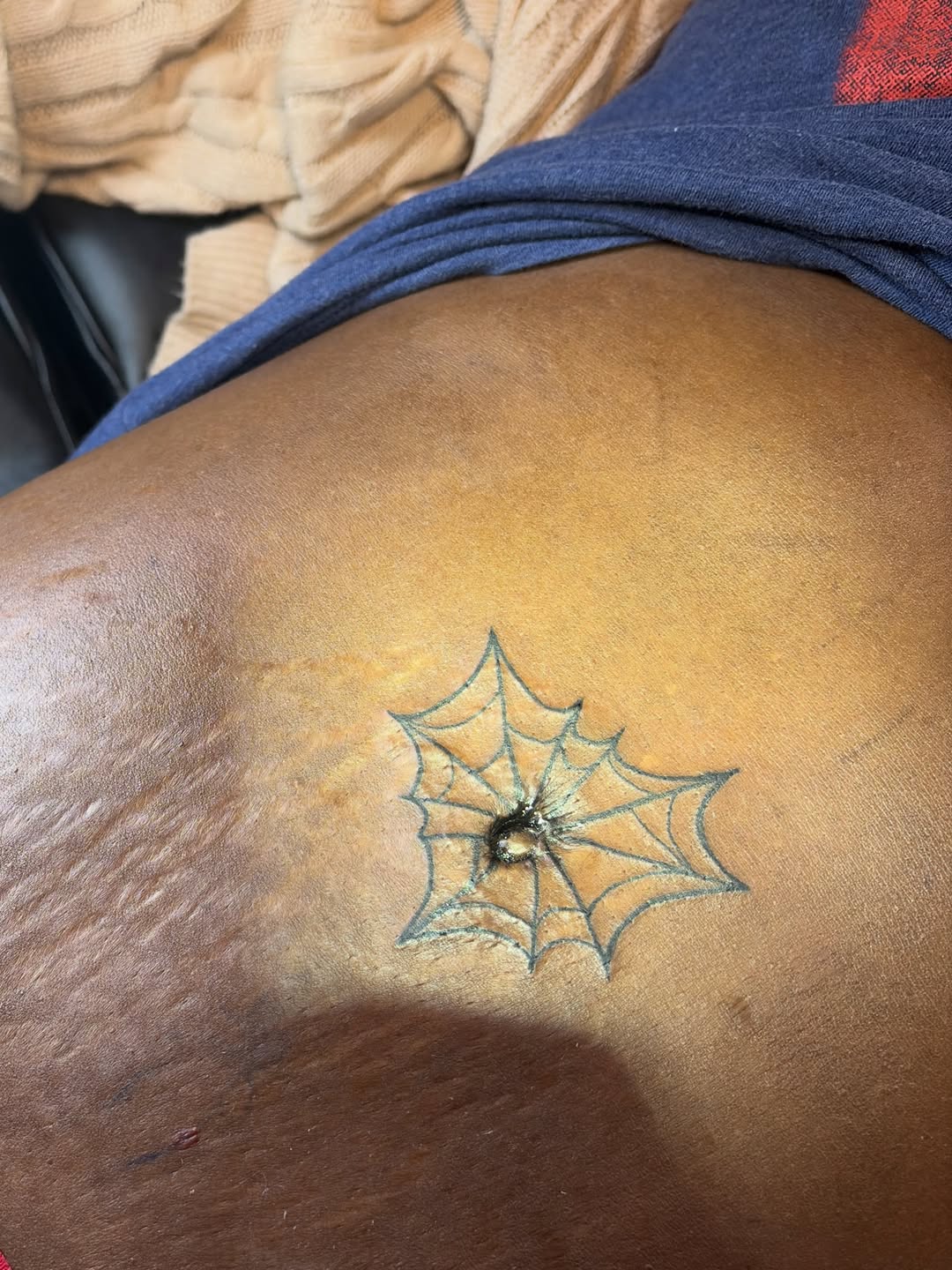 Spider web tattoo on the thigh by Khemar InspiredByLife 🇯🇲