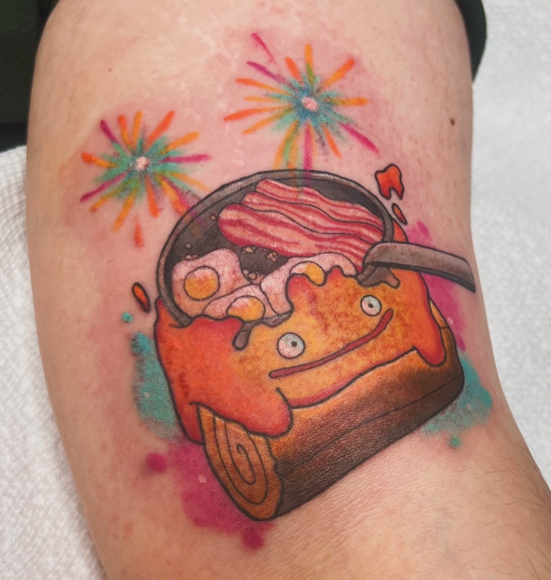 Breakfast pancake watercolor tattoo on the forearm by Holly Lednum