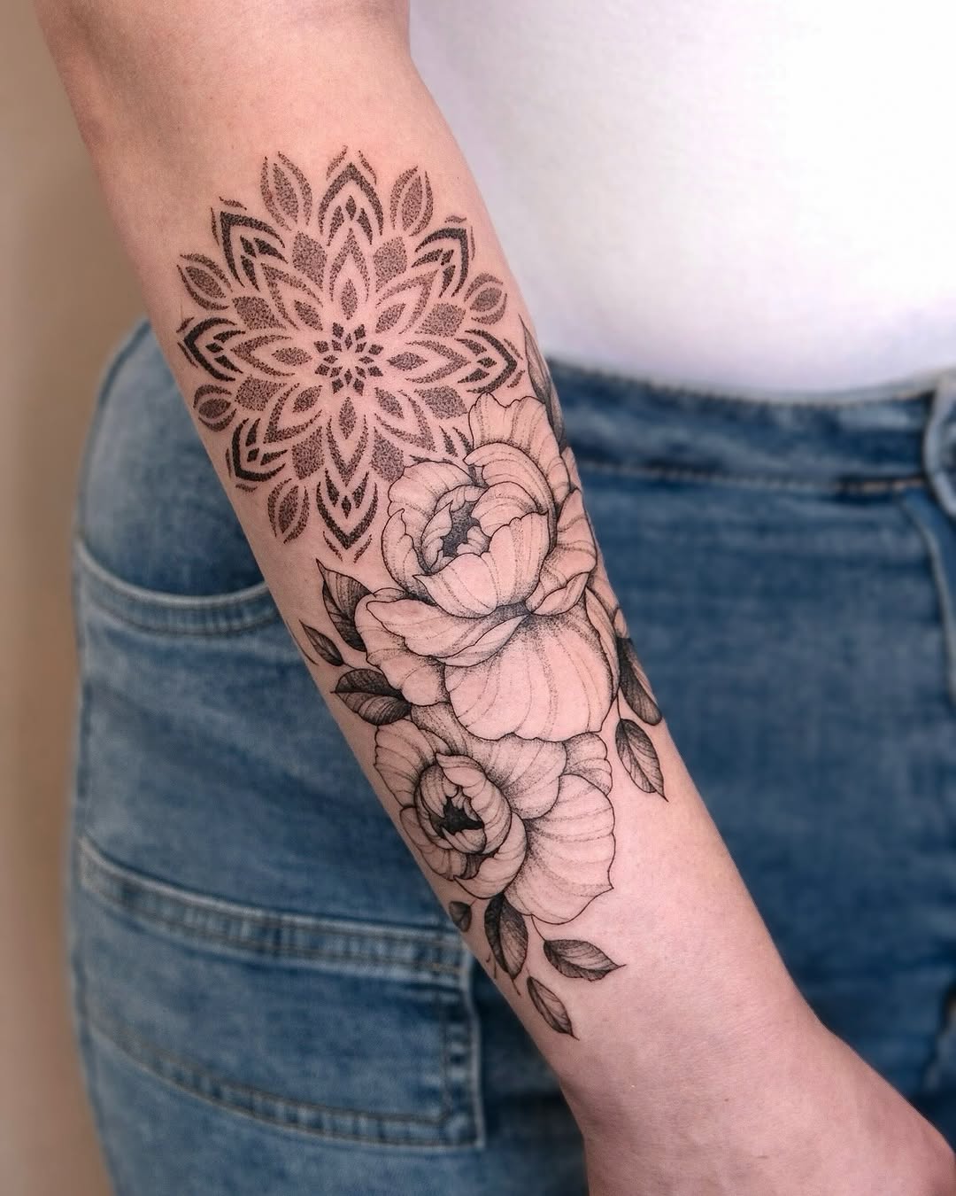 Mandala and peonies dotwork tattoo on the forearm by Your tattoo Artist, New York, New York