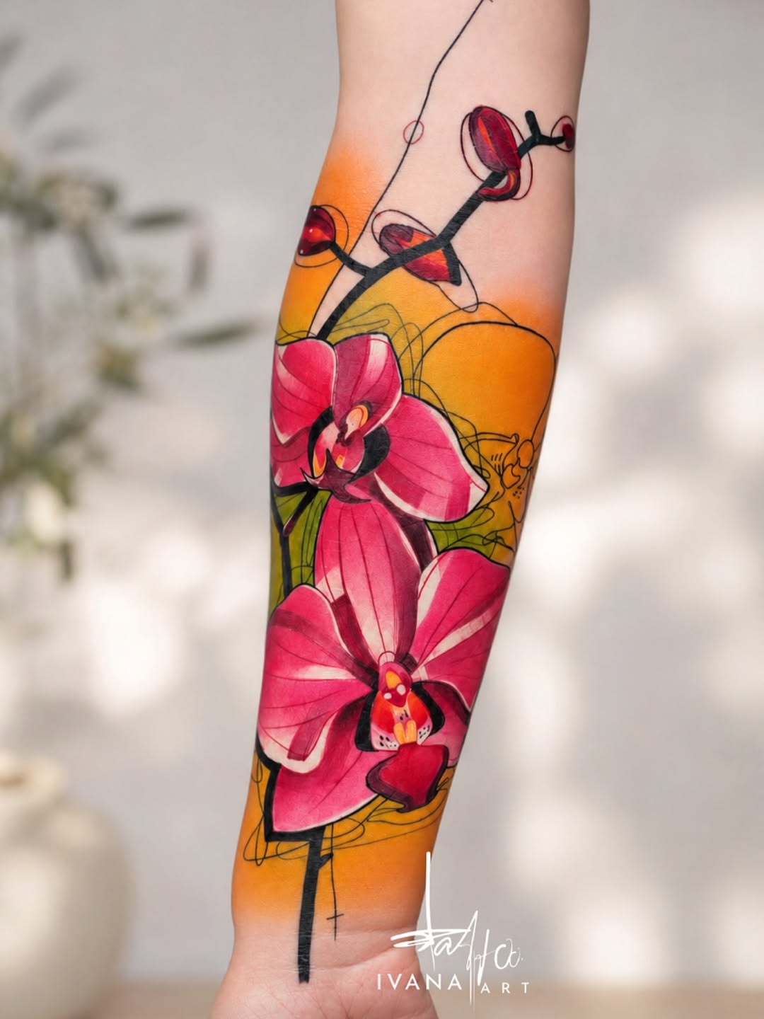 Pink orchids watercolor tattoo on the forearm by Ivana Belakova