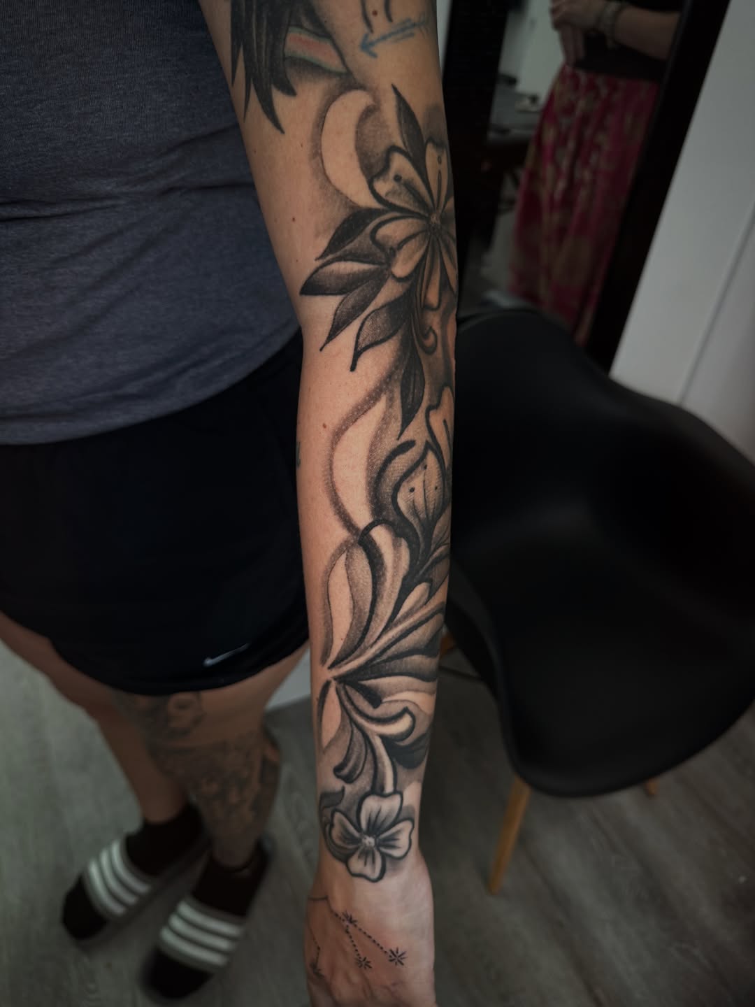 Floral and ornamental sleeve fine line tattoo on the forearm by James ⚡️ Tattoo Artist