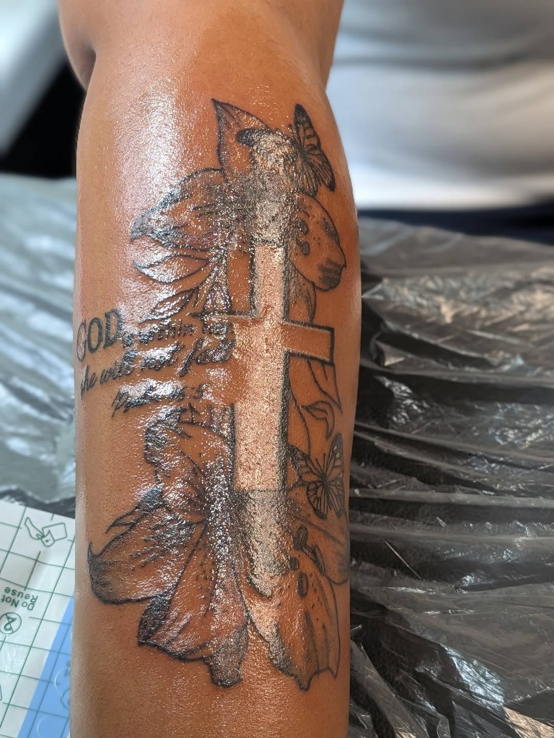 Cross with flowers and butterflies fine line tattoo on the forearm by 𝐁𝐮𝐧𝐧𝐲 𝐒𝐡𝐨𝐩 𝐓𝐚𝐭𝐳 𝐍 𝐂𝐮𝐭𝐳