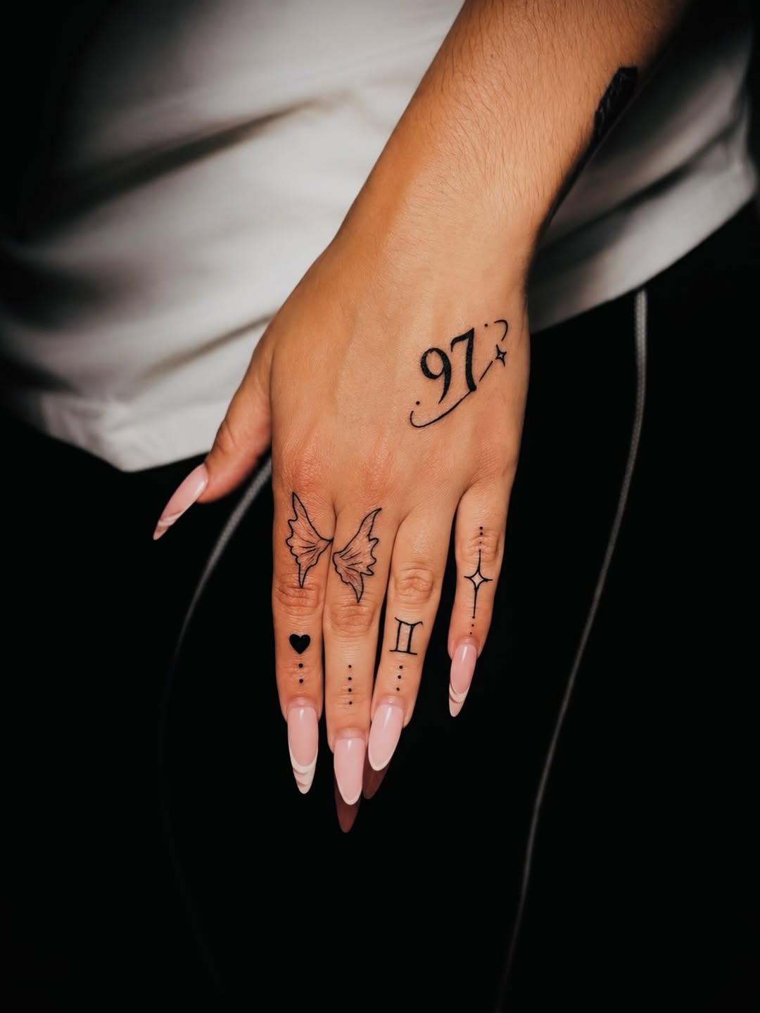 Lettering tattoo on the hand by Montero Ink™