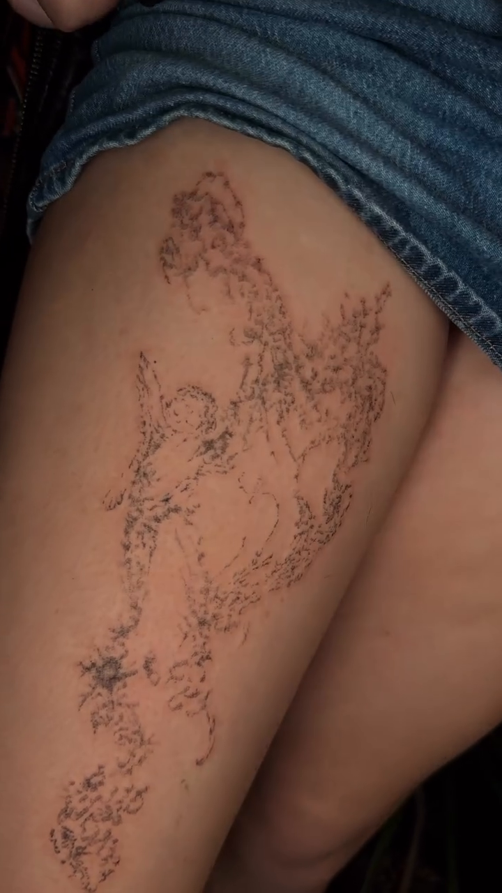 Abstract flowing design cyber sigilism tattoo on the thigh by Seattle Cybersigilism Tattoo Horror