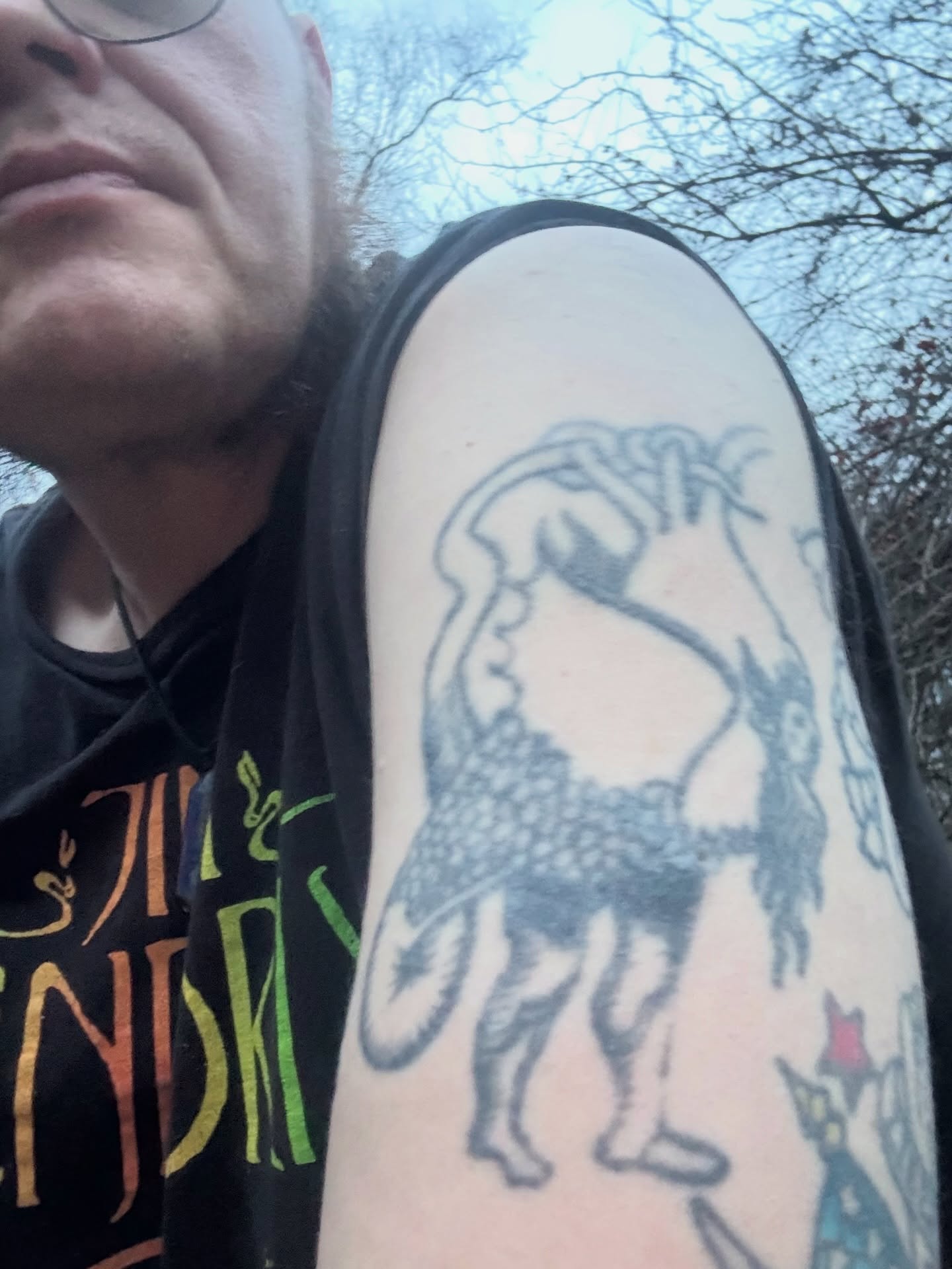 Tattoo by @strangebreu — black_and_grey